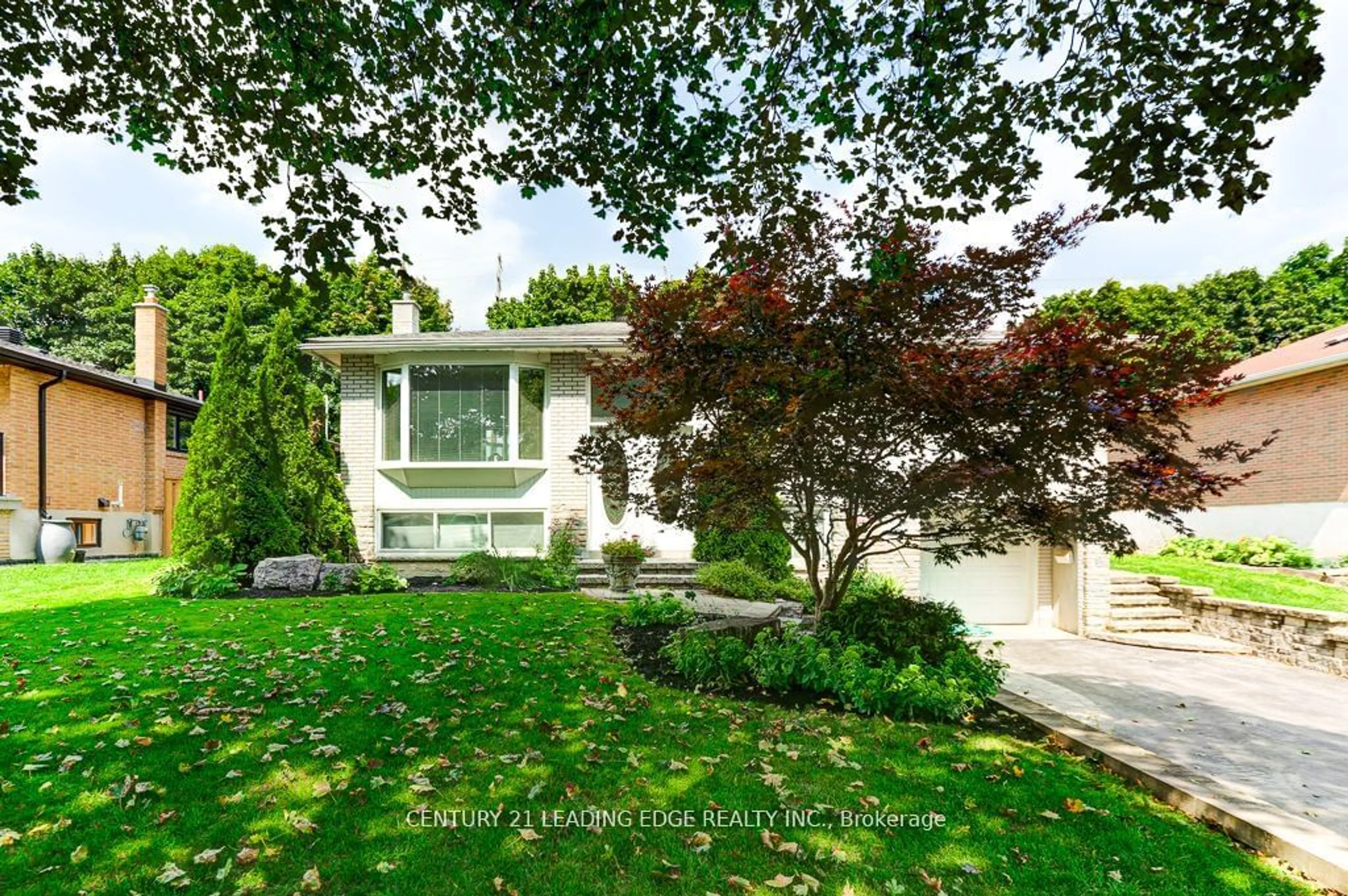 Frontside or backside of a home, the street view for 20 Bakerdale Rd, Markham Ontario L3P 1J4