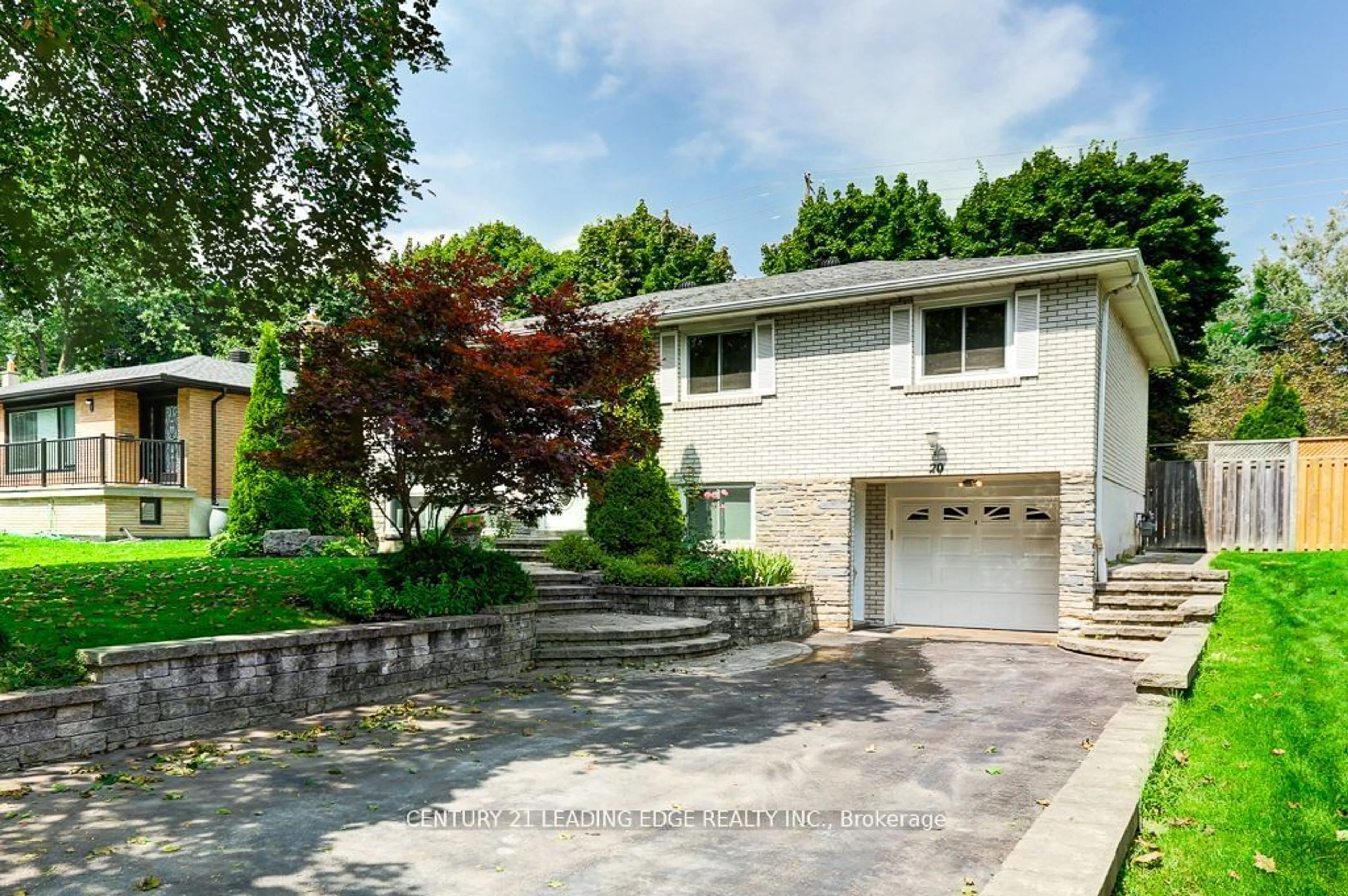 Frontside or backside of a home, the street view for 20 Bakerdale Rd, Markham Ontario L3P 1J4