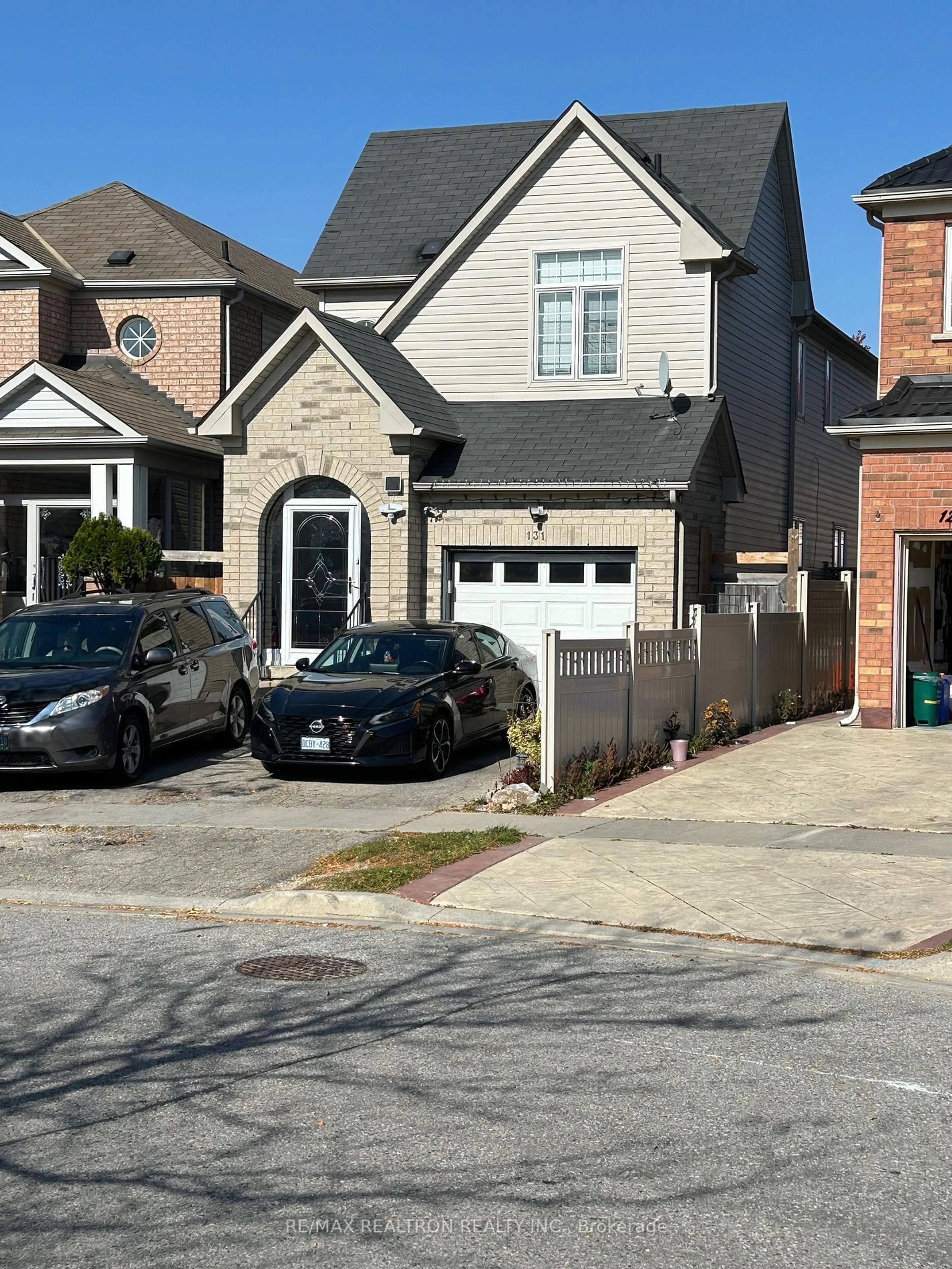 Frontside or backside of a home, the street view for 131 Ferncliffe Cres, Markham Ontario L3S 4N7