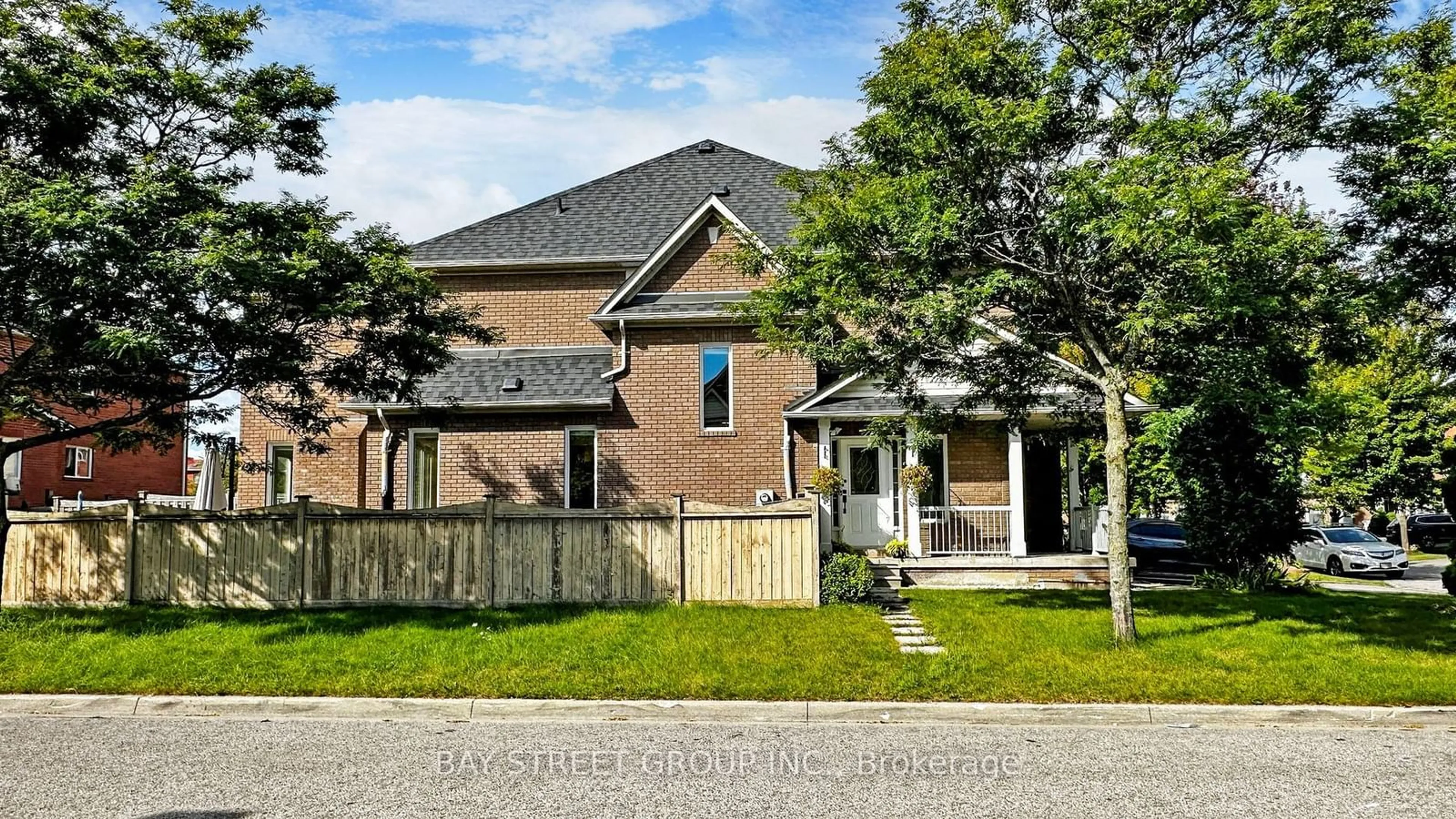 Frontside or backside of a home, the fenced backyard for 27 Boxhill Rd, Markham Ontario L3S 4R1