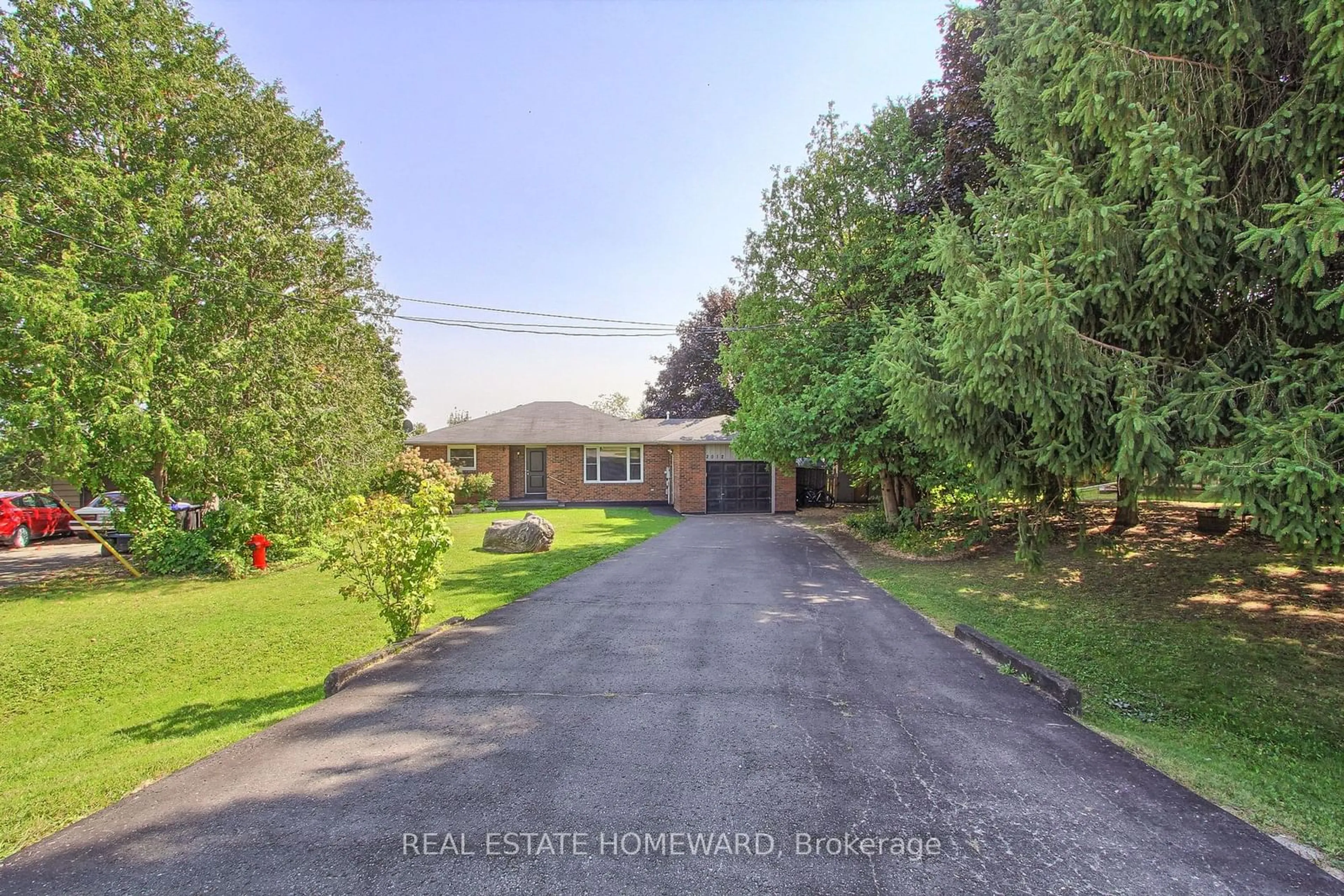 Frontside or backside of a home, the street view for 2012 Lea Rd, Innisfil Ontario L9S 1T3