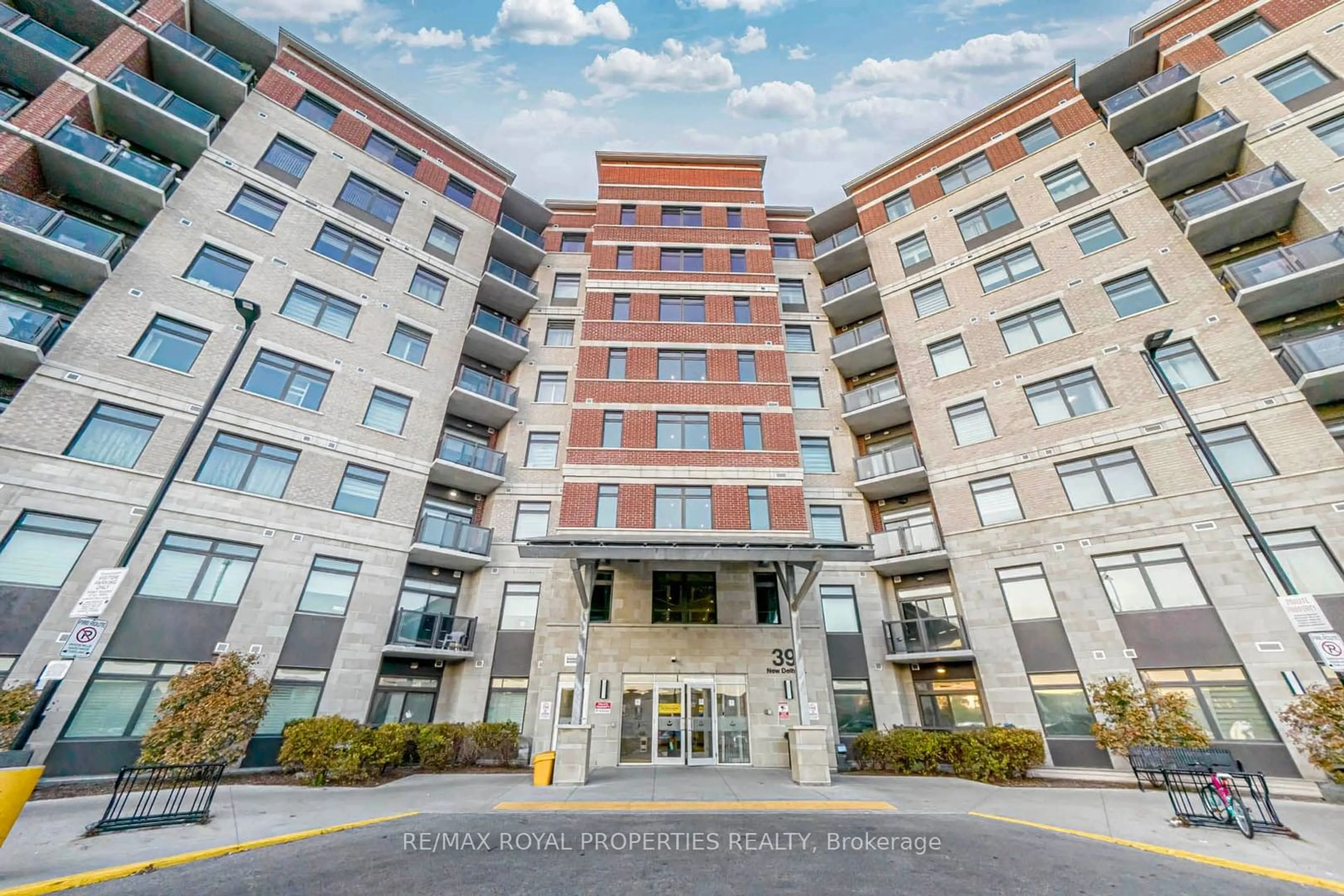 A pic from exterior of the house or condo, the front or back of building for 39 New Delhi Dr #407, Markham Ontario L3S 0E1