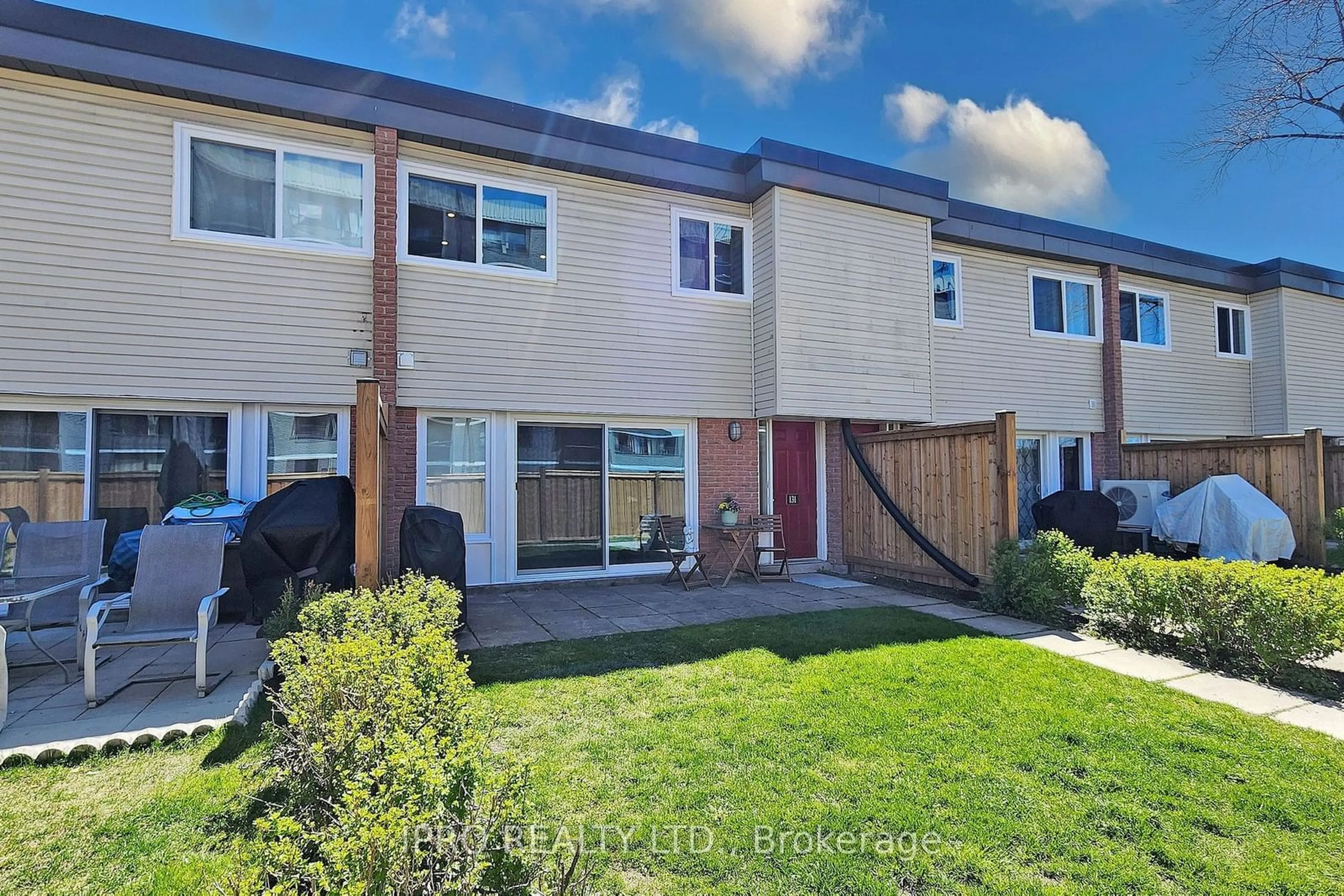 A pic from exterior of the house or condo, the fenced backyard for 131 Milestone Cres, Aurora Ontario L4G 3M2