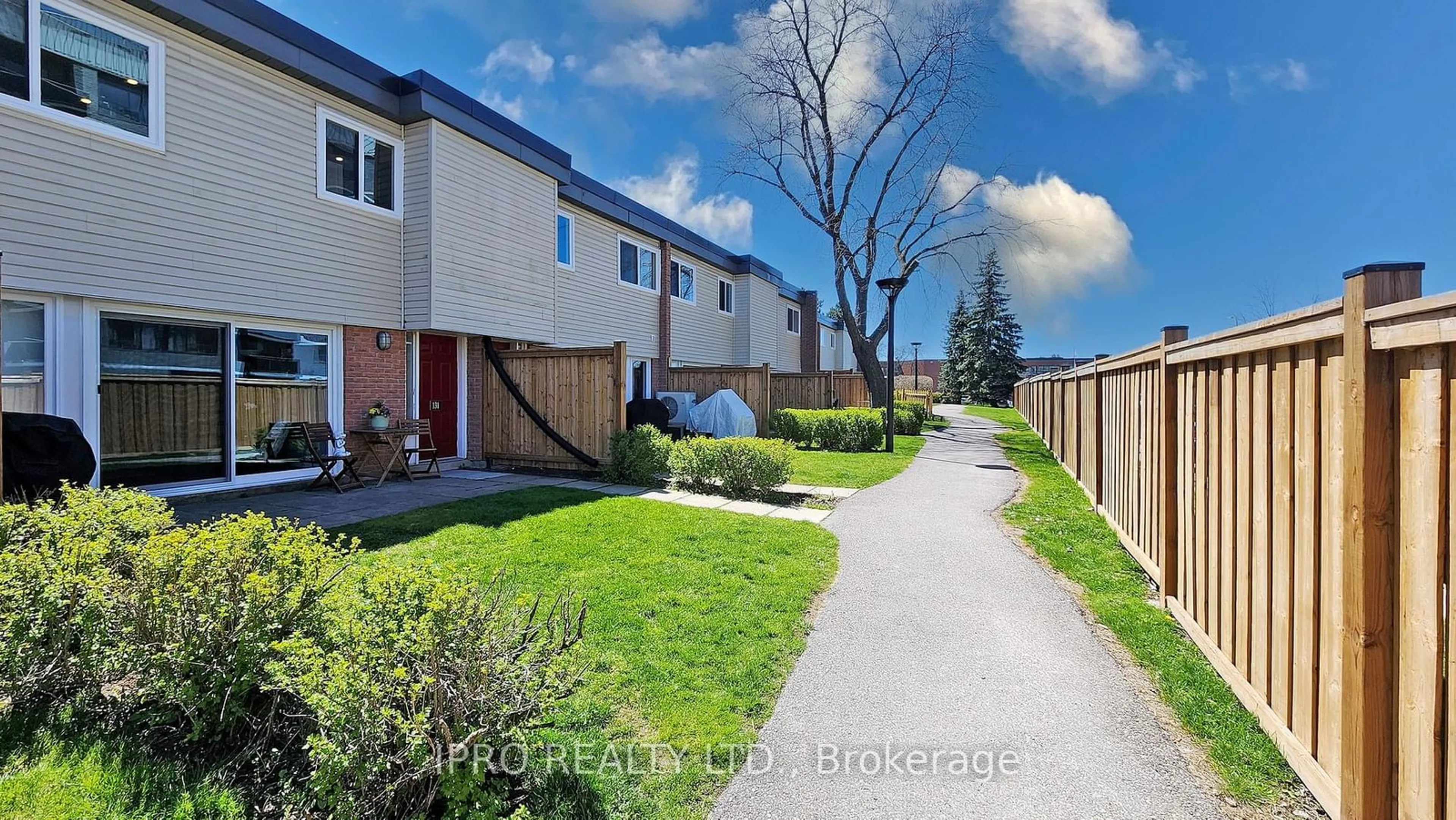 A pic from exterior of the house or condo, the fenced backyard for 131 Milestone Cres, Aurora Ontario L4G 3M2