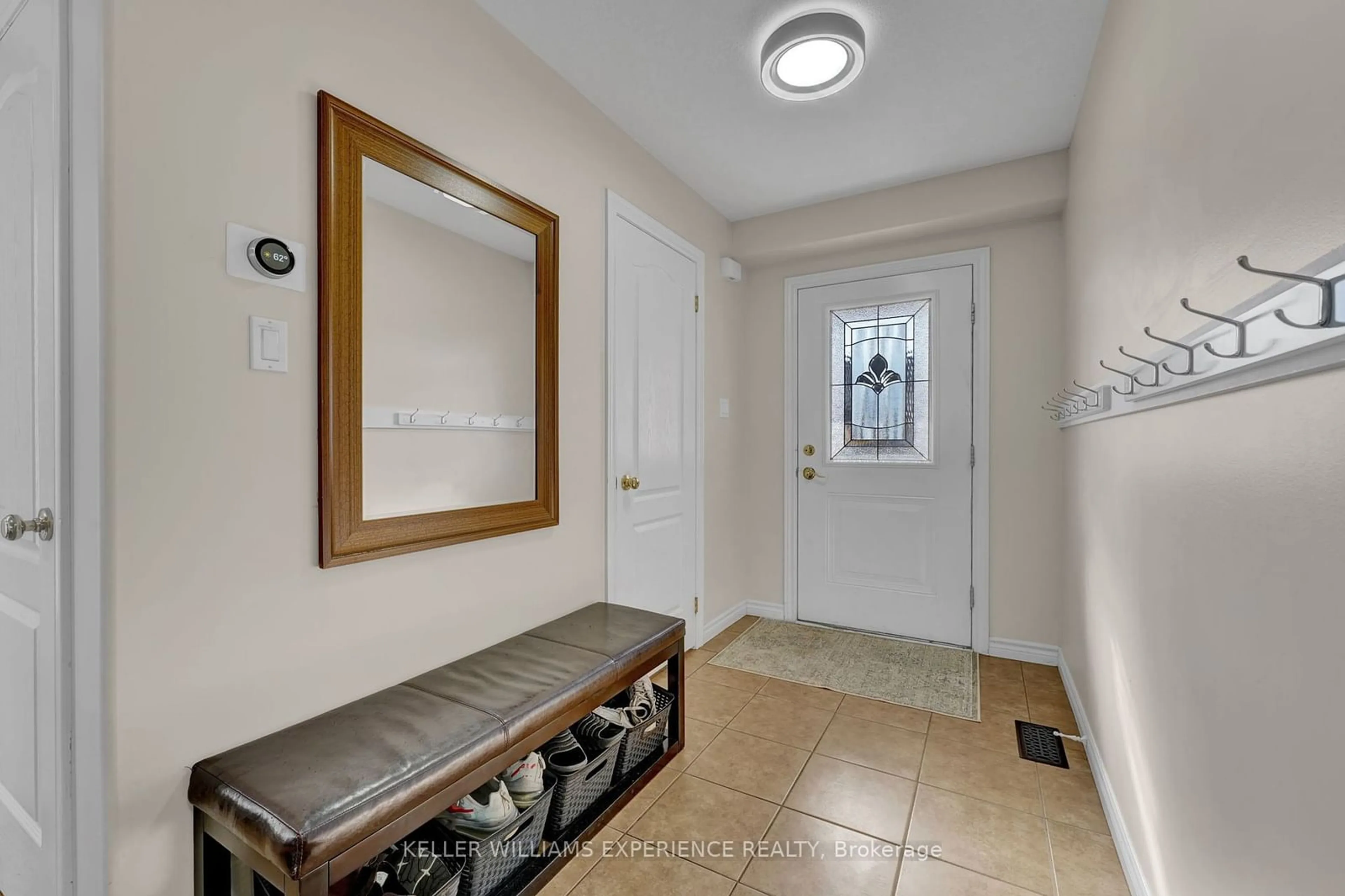 Indoor entryway, wood floors for 34 QUIGLEY St, Essa Ontario L3W 0P3