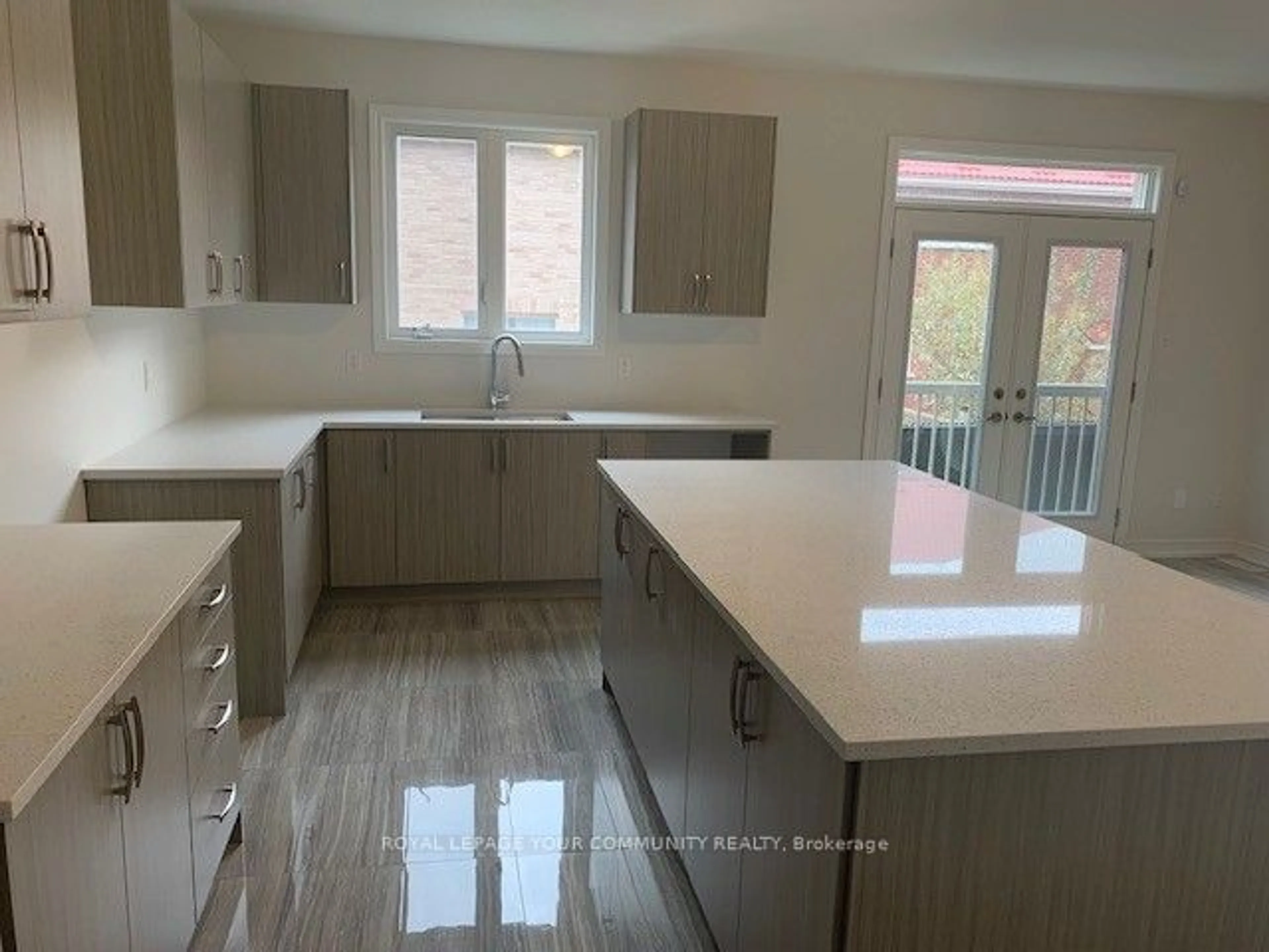 Open concept kitchen for 61 Bud Leggett Cres, Georgina Ontario L4P 0T1