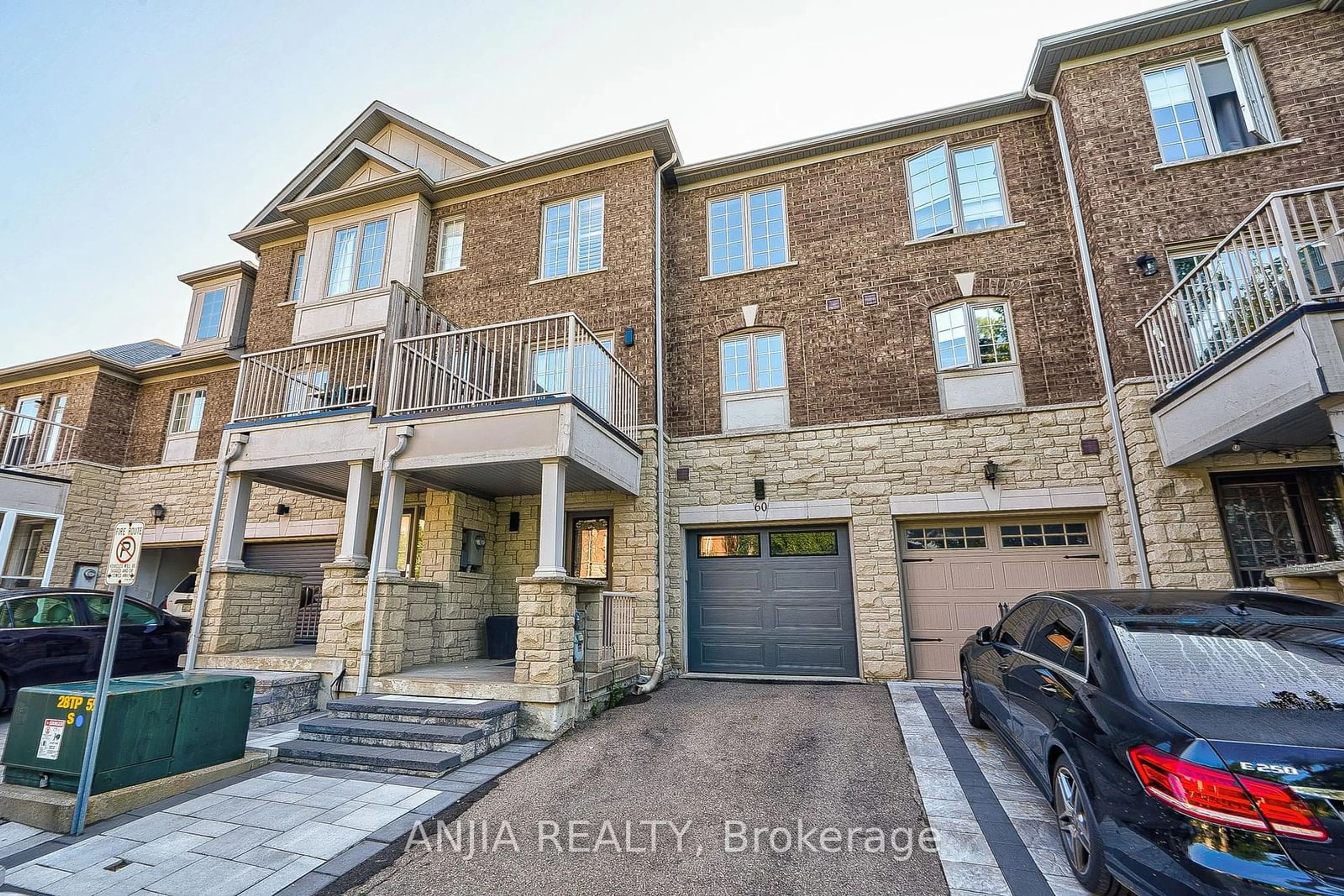 A pic from exterior of the house or condo, the street view for 60 Thoroughbred Way, Markham Ontario L6C 0B6