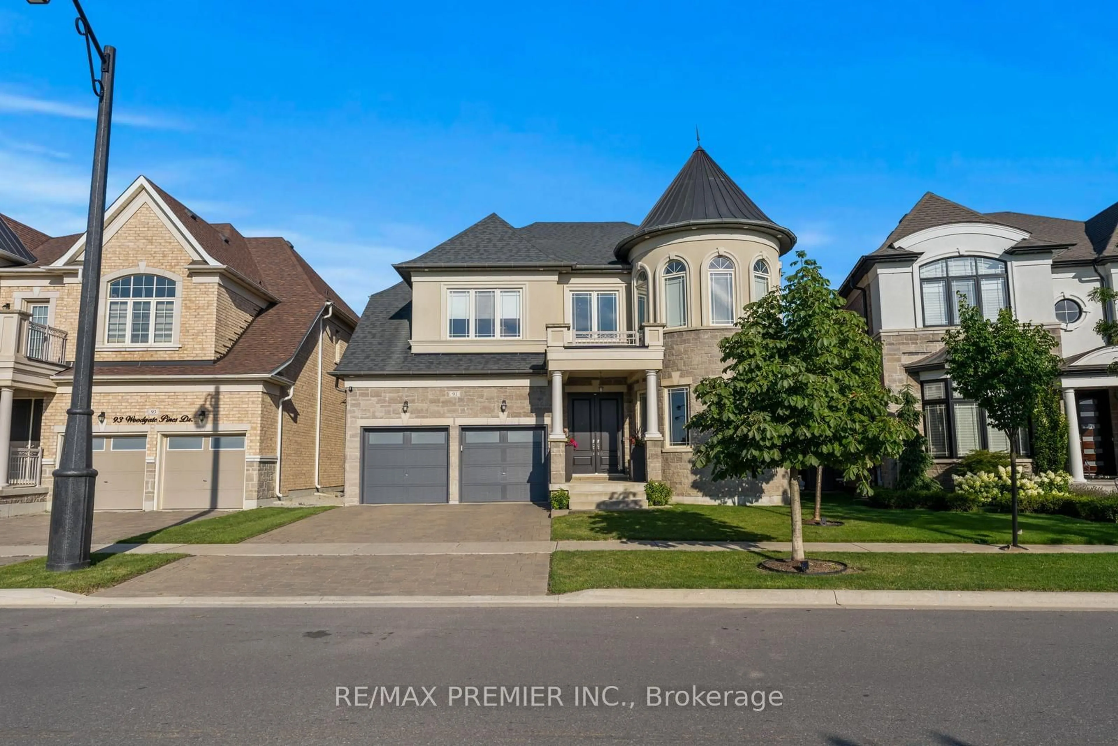 Frontside or backside of a home, the street view for 91 Woodgate Pines Dr, Vaughan Ontario L4H 4A4