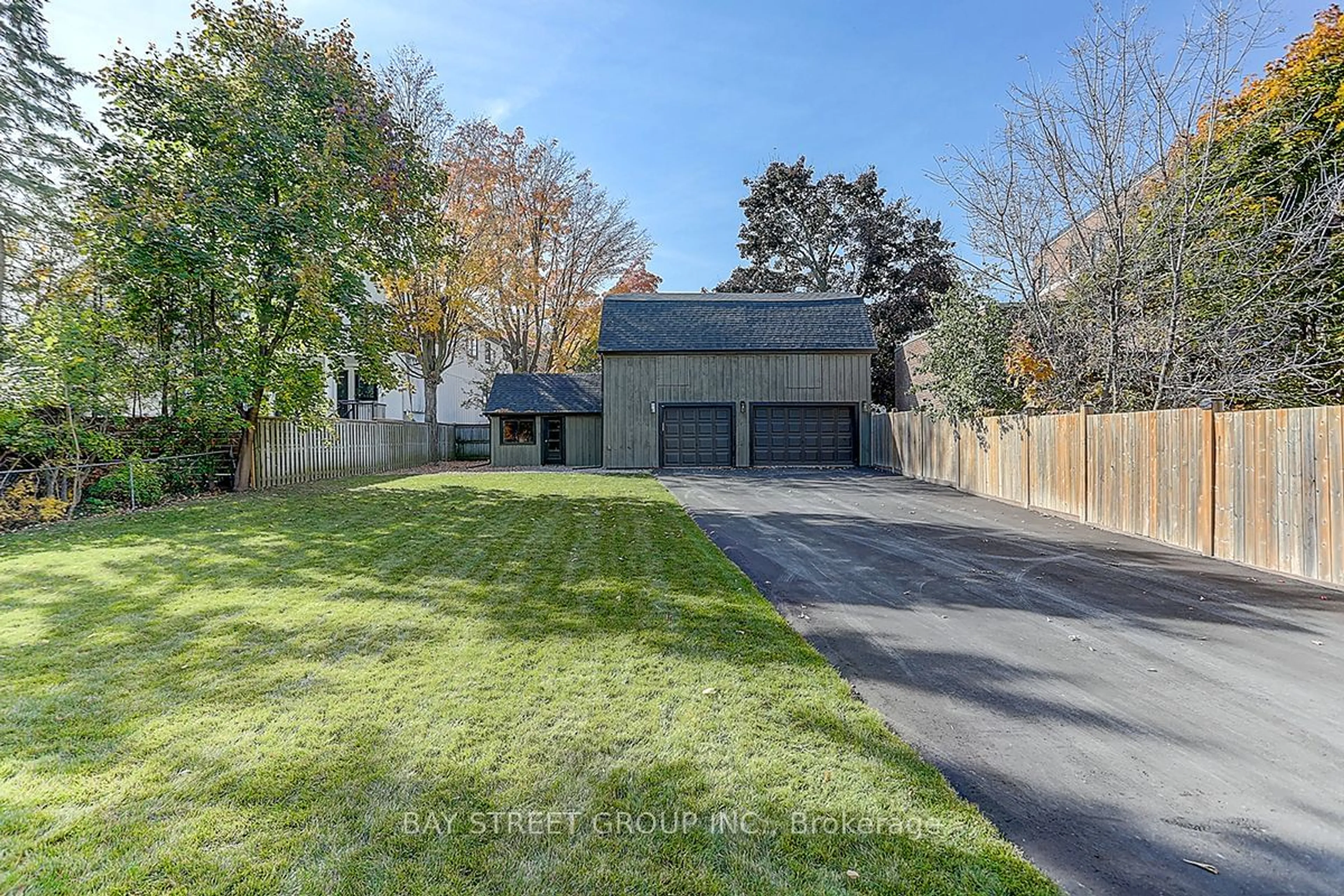 Frontside or backside of a home, the fenced backyard for 24 O'brien Ave, Whitchurch-Stouffville Ontario L4A 1G6