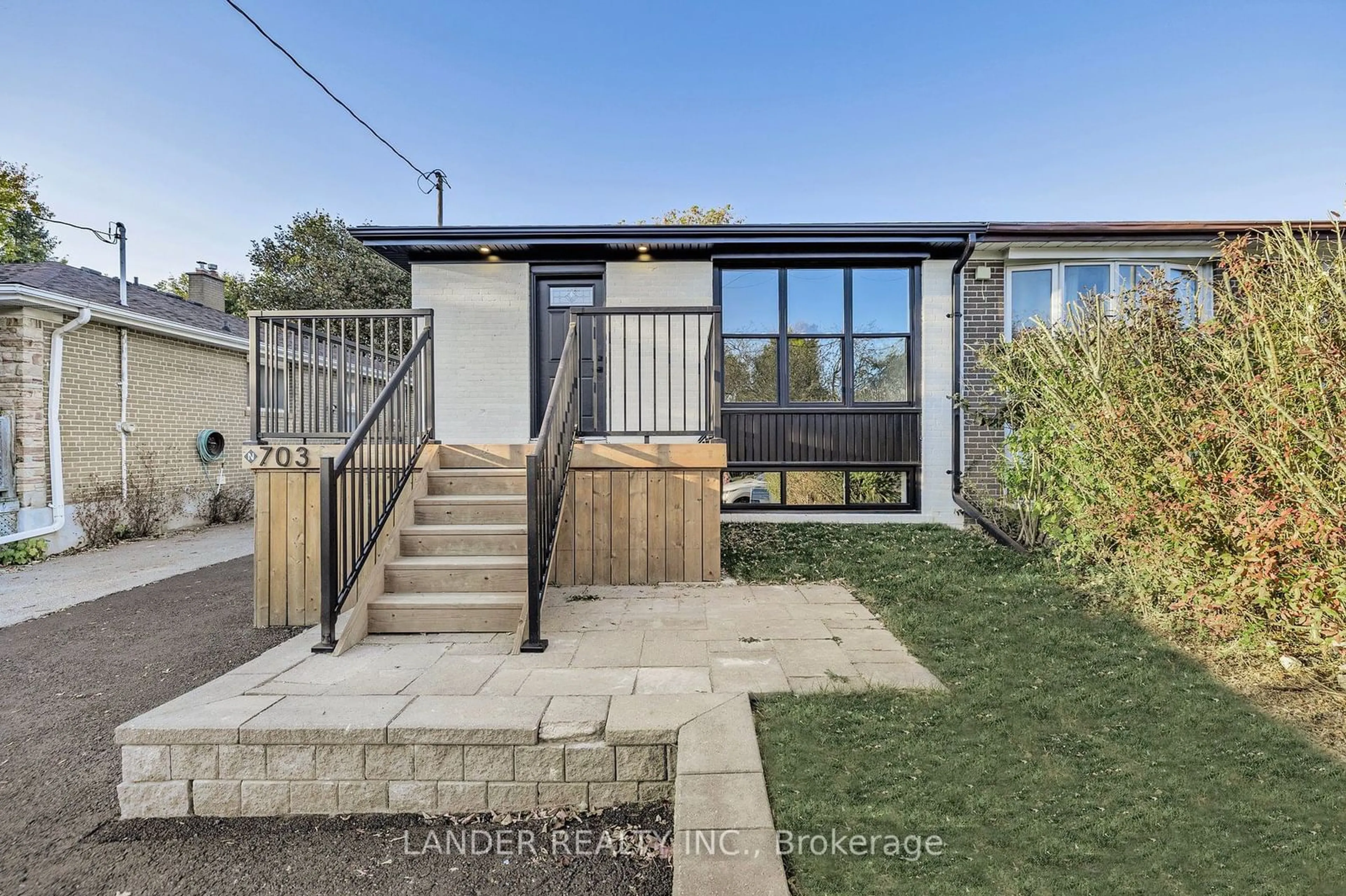 Frontside or backside of a home, the fenced backyard for 703 Sunnypoint Dr, Newmarket Ontario L3Y 2Z7