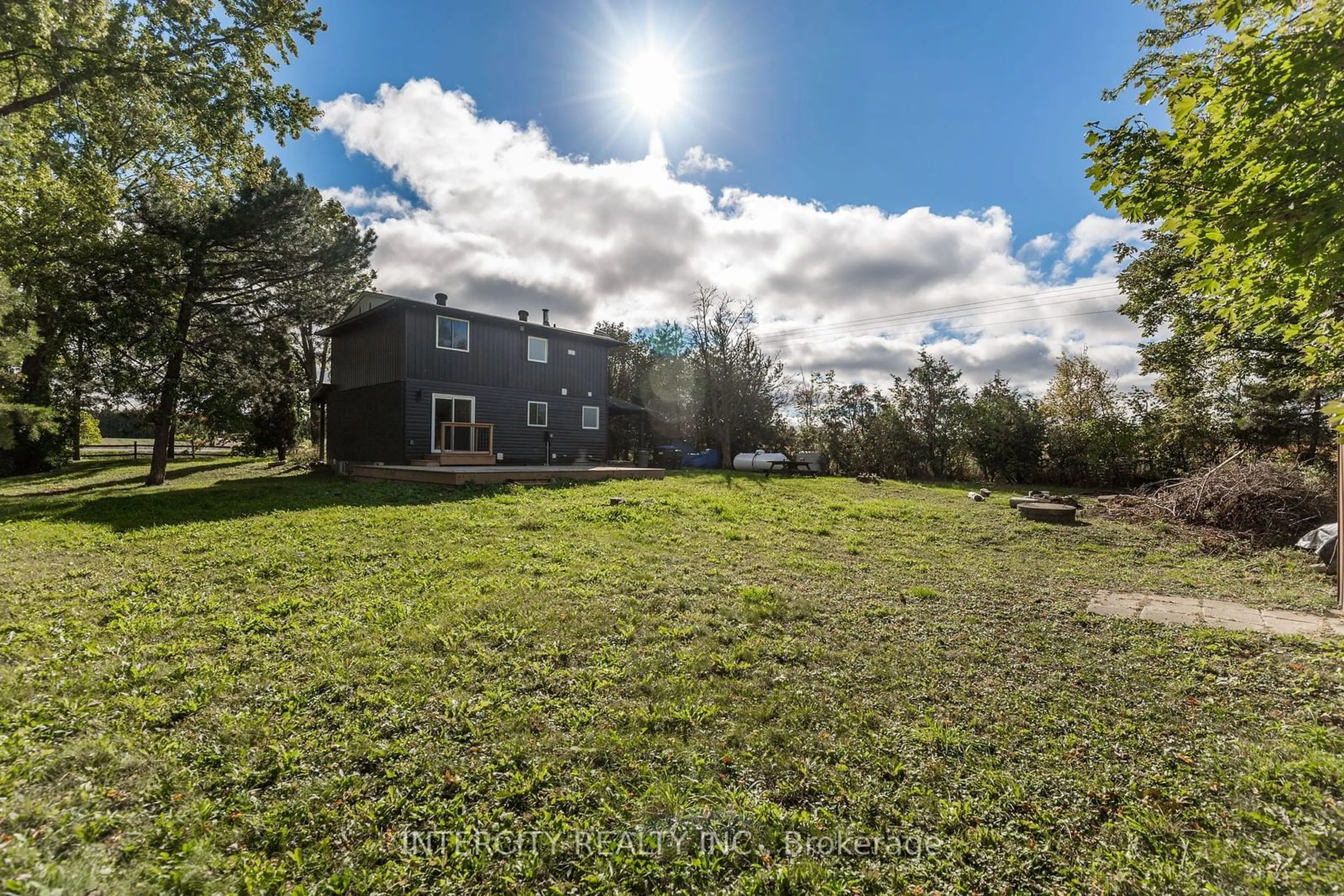 A pic from exterior of the house or condo, the fenced backyard for 4806 5th Sdrd, Essa Ontario L0L 2N2