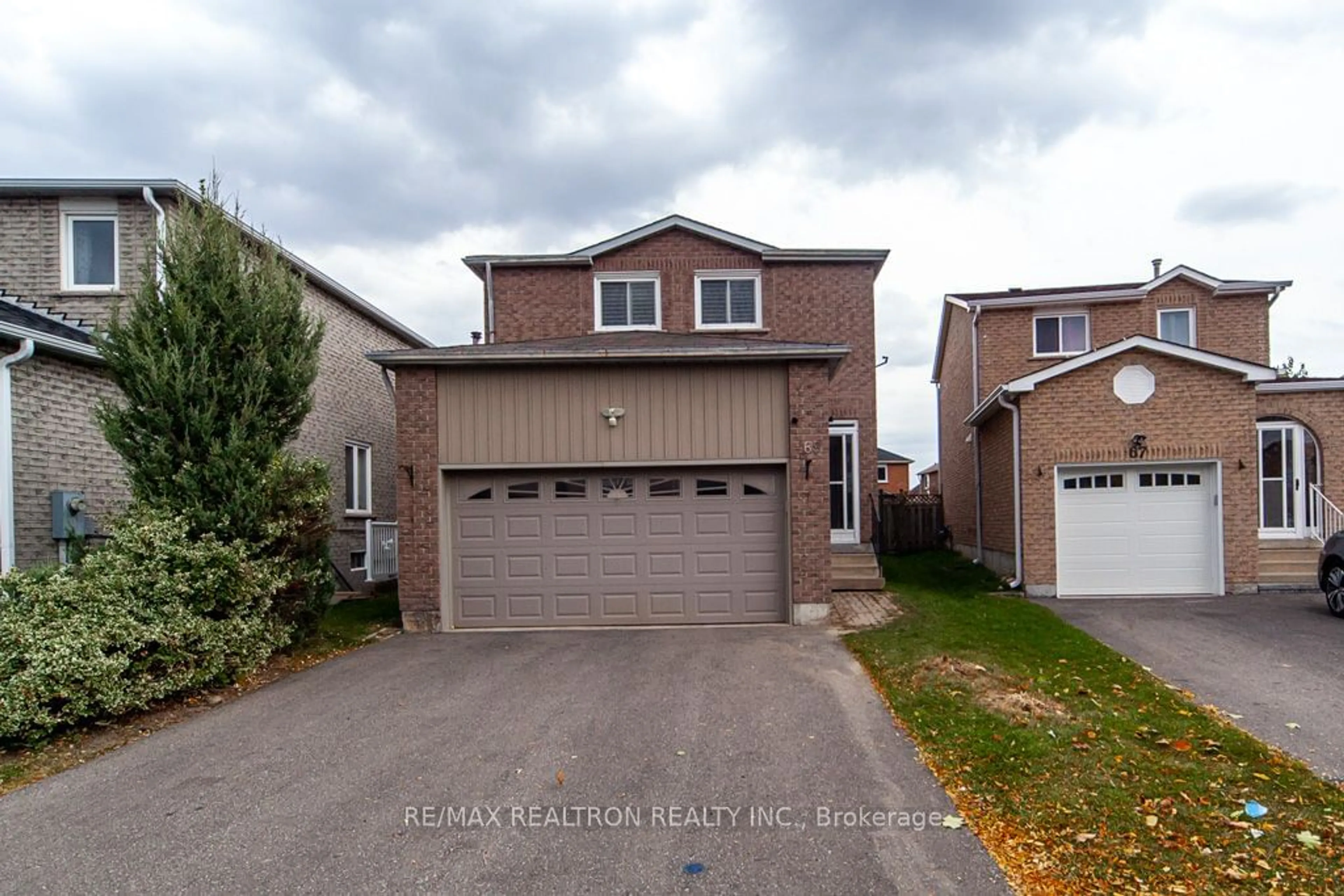 Frontside or backside of a home, the street view for 69 Ketchum Cres, Markham Ontario L3S 3G3