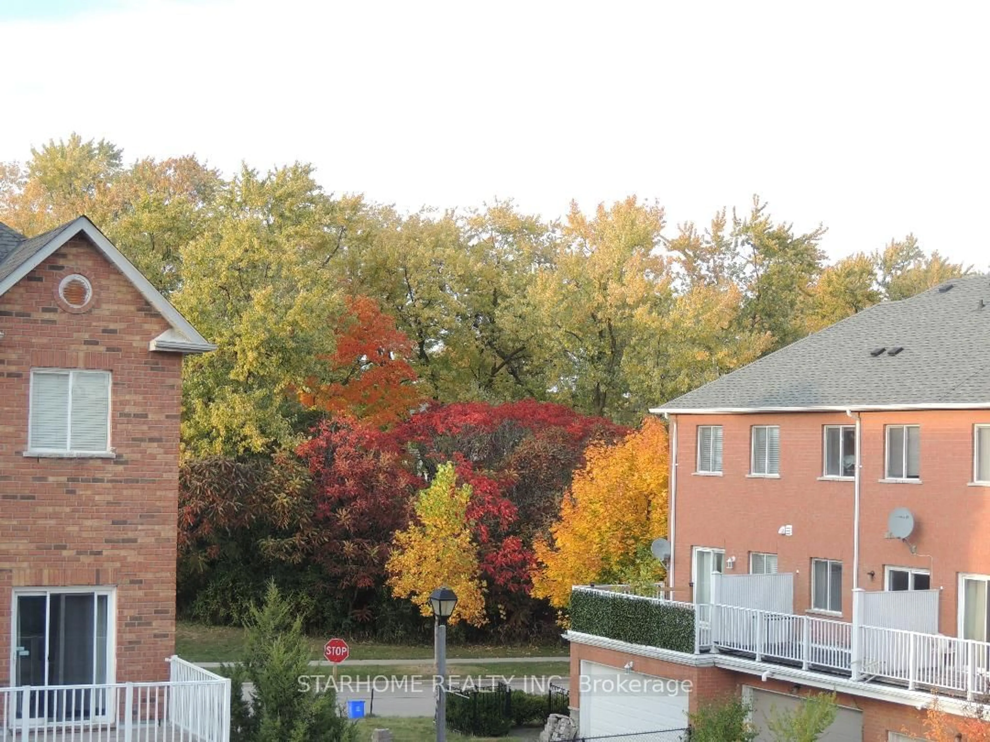 A pic from exterior of the house or condo, the fenced backyard for 51 Leitchcroft Cres, Markham Ontario L3T 7T9