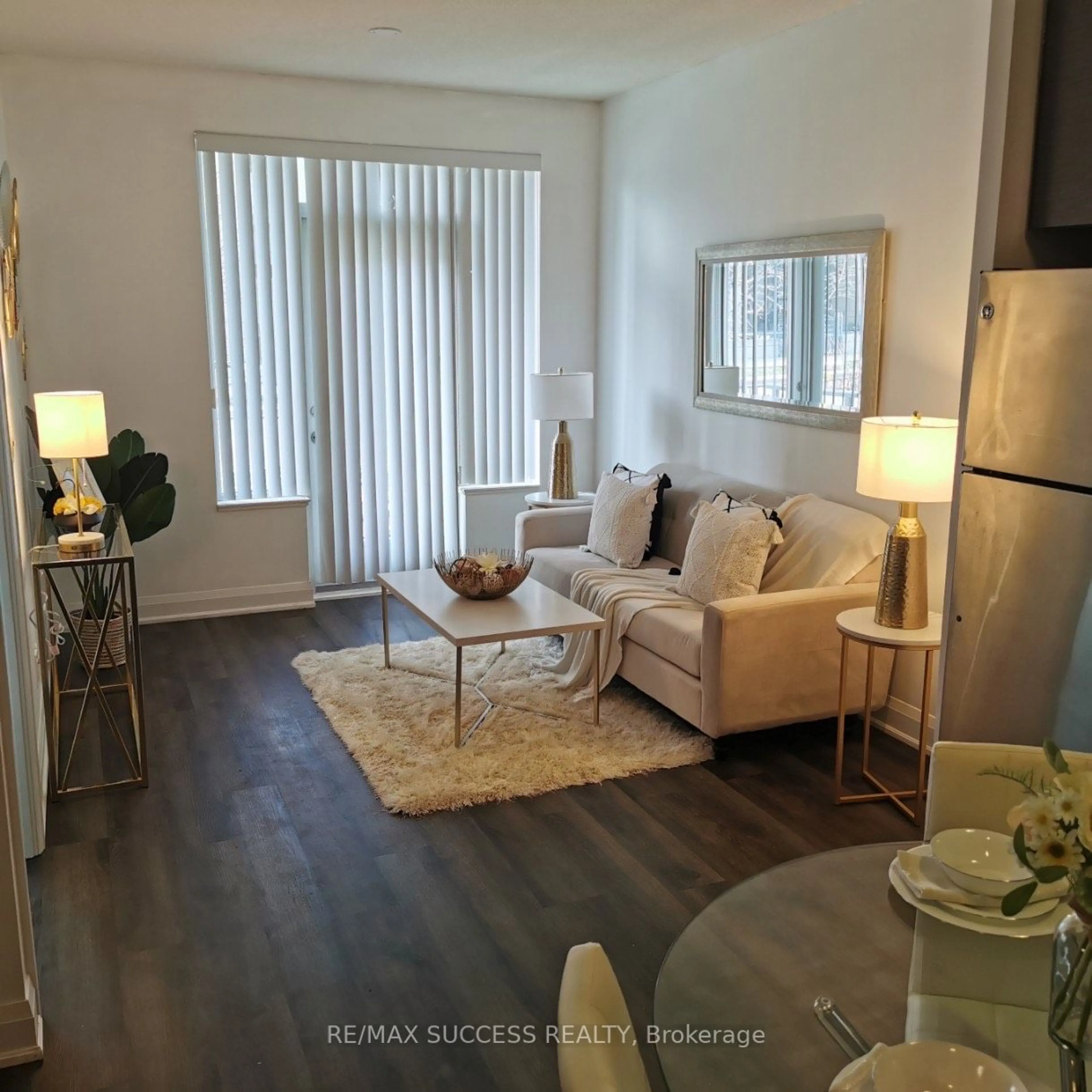 Living room, wood floors for 1 Uptown Dr #108, Markham Ontario L3R 5C1