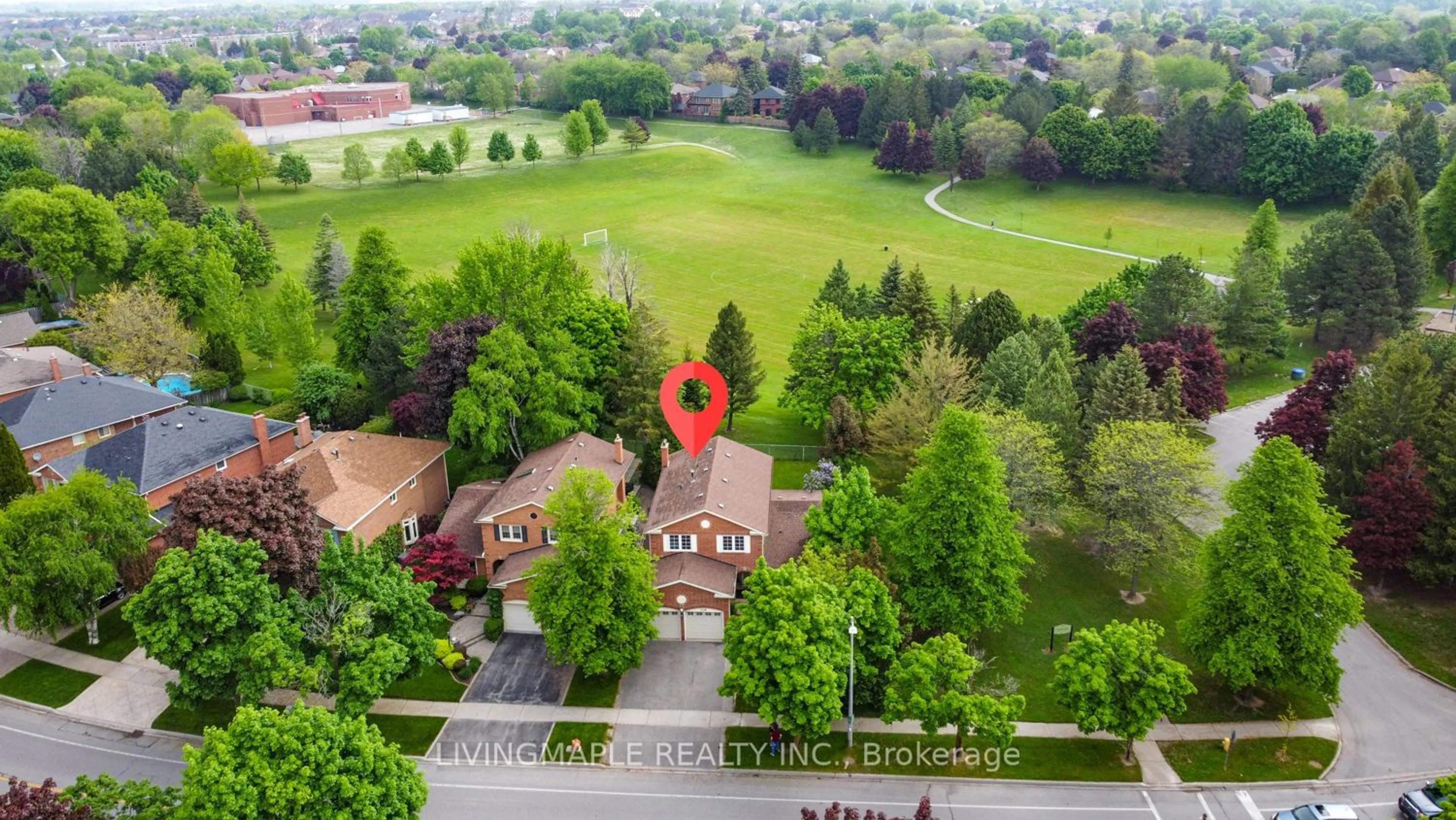 A pic from exterior of the house or condo, the fenced backyard for 110 Fincham Ave, Markham Ontario L3P 4E1