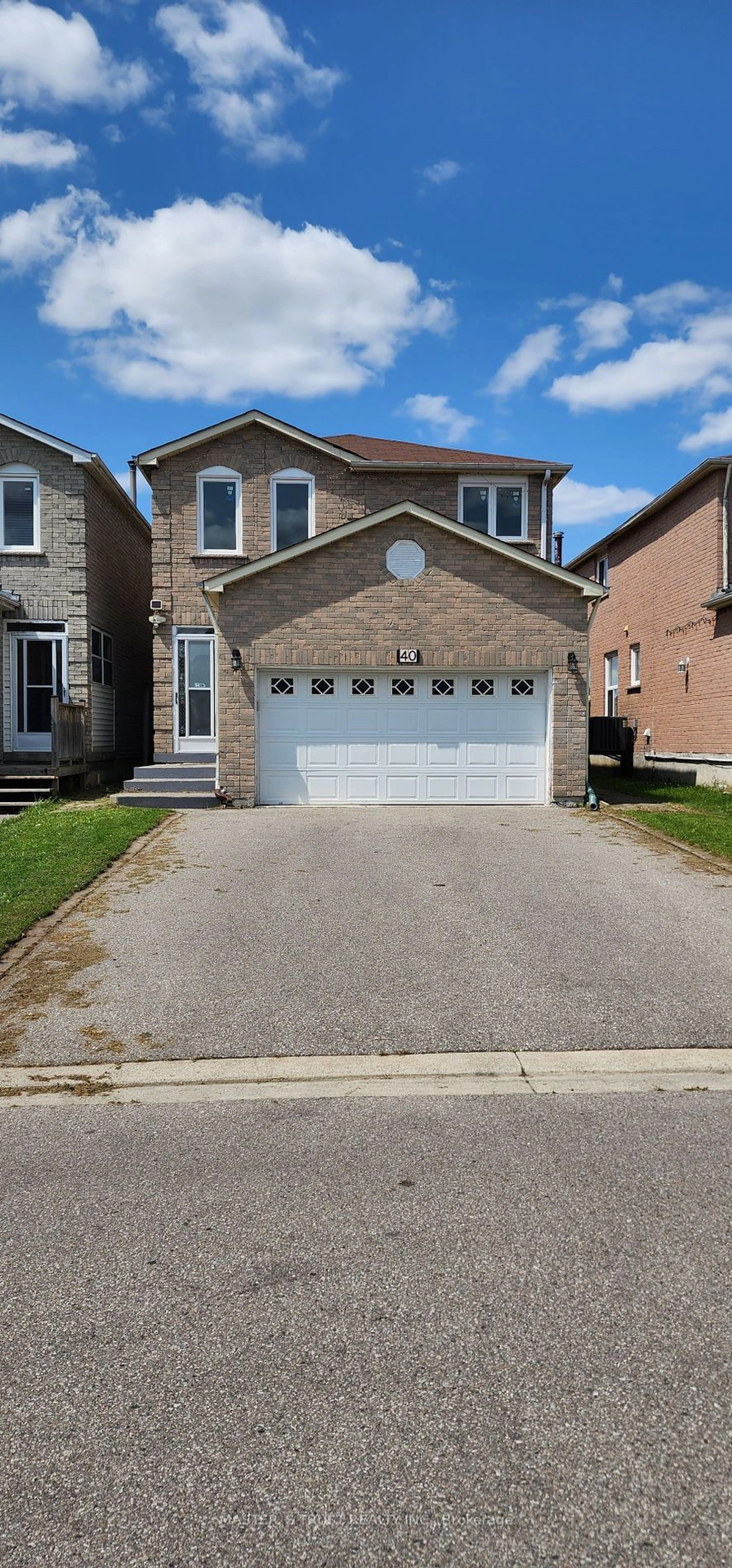 Frontside or backside of a home, the street view for 40 Page Cres, Markham Ontario L3S 1W1