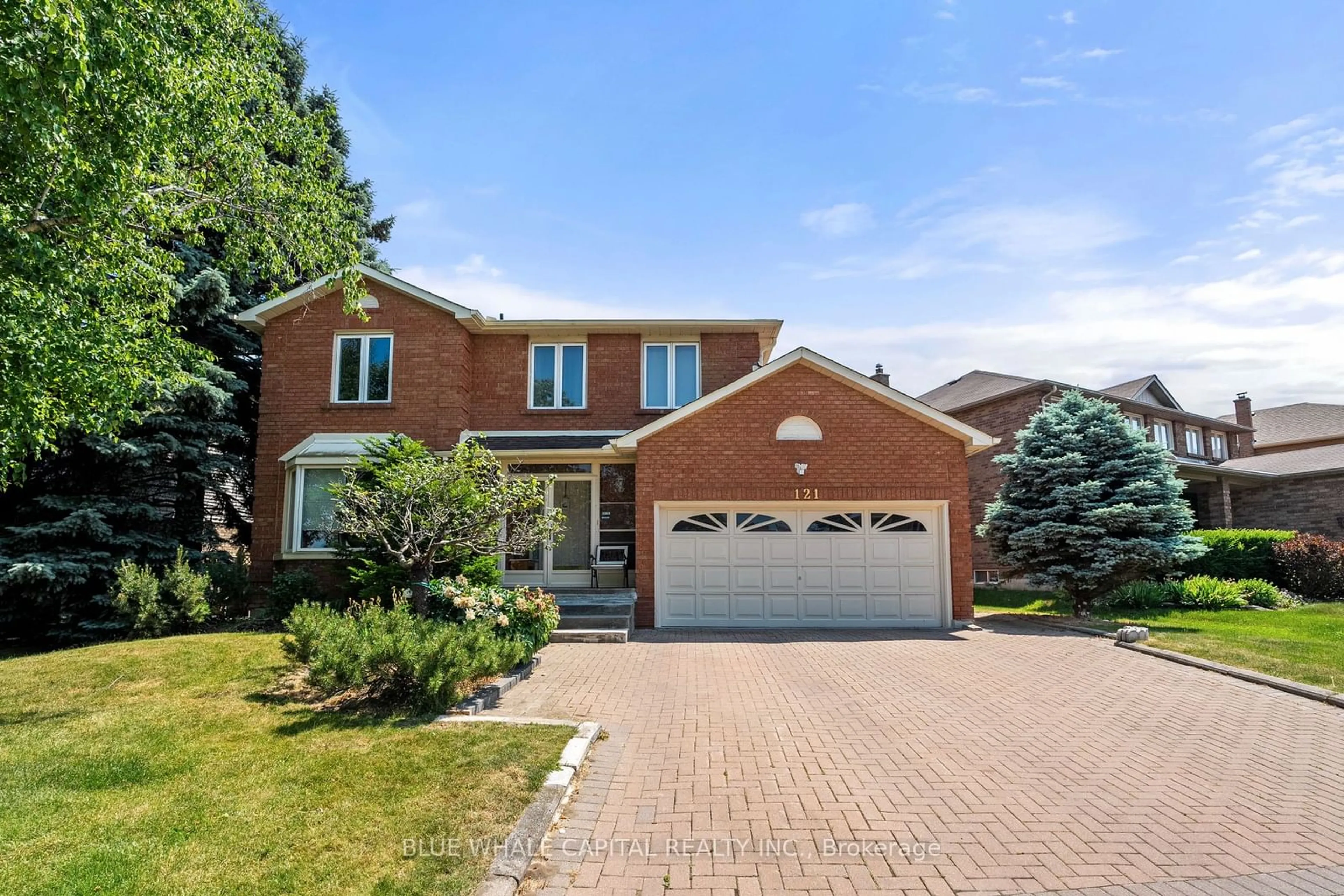 Home with brick exterior material for 121 Huntington Park Dr, Markham Ontario L3T 7C8