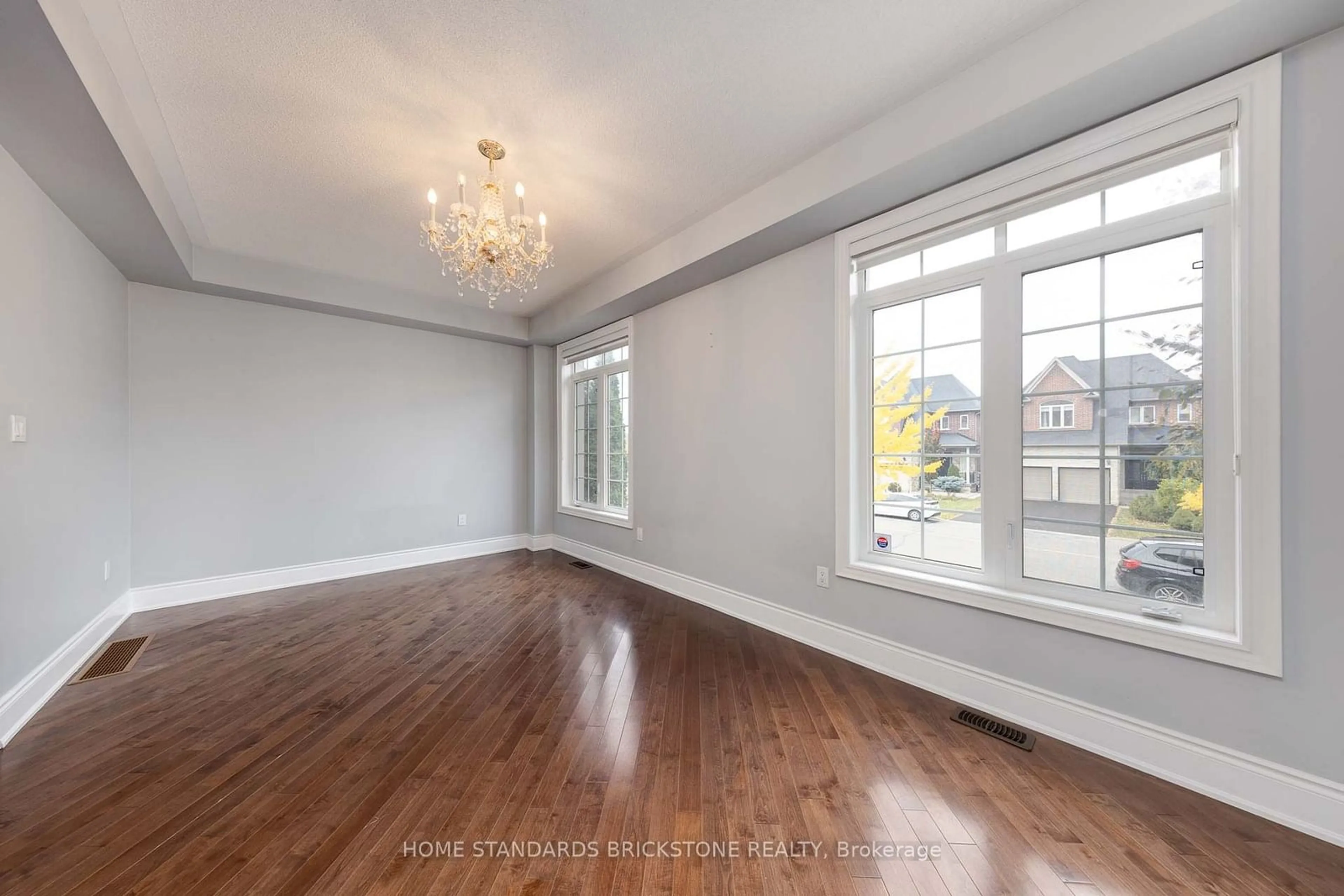 A pic of a room, wood floors for 159 Towngate Dr, Vaughan Ontario L4J 8J5