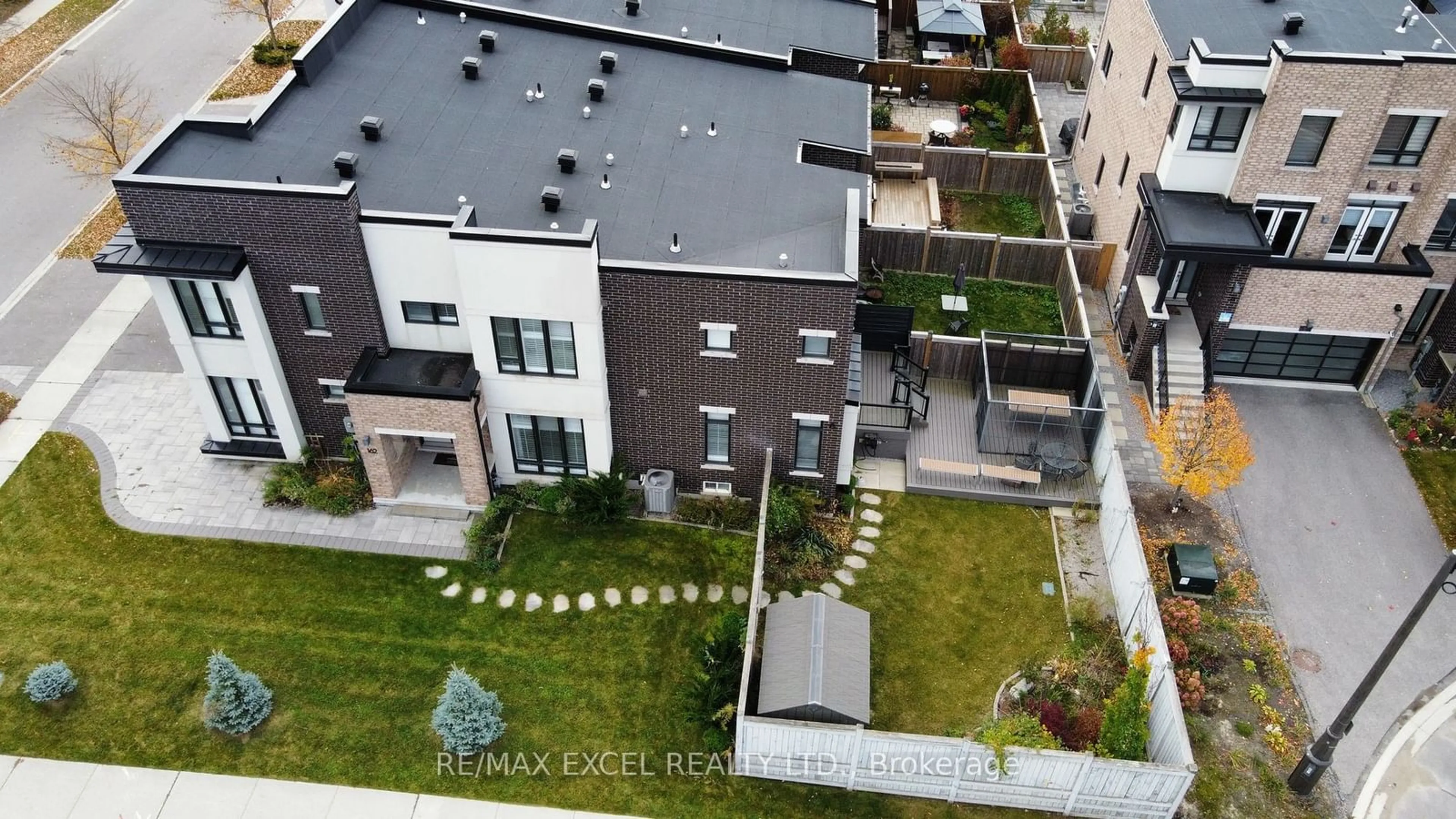 A pic from exterior of the house or condo, the fenced backyard for 162 Anchusa Dr, Richmond Hill Ontario L4B 5B6