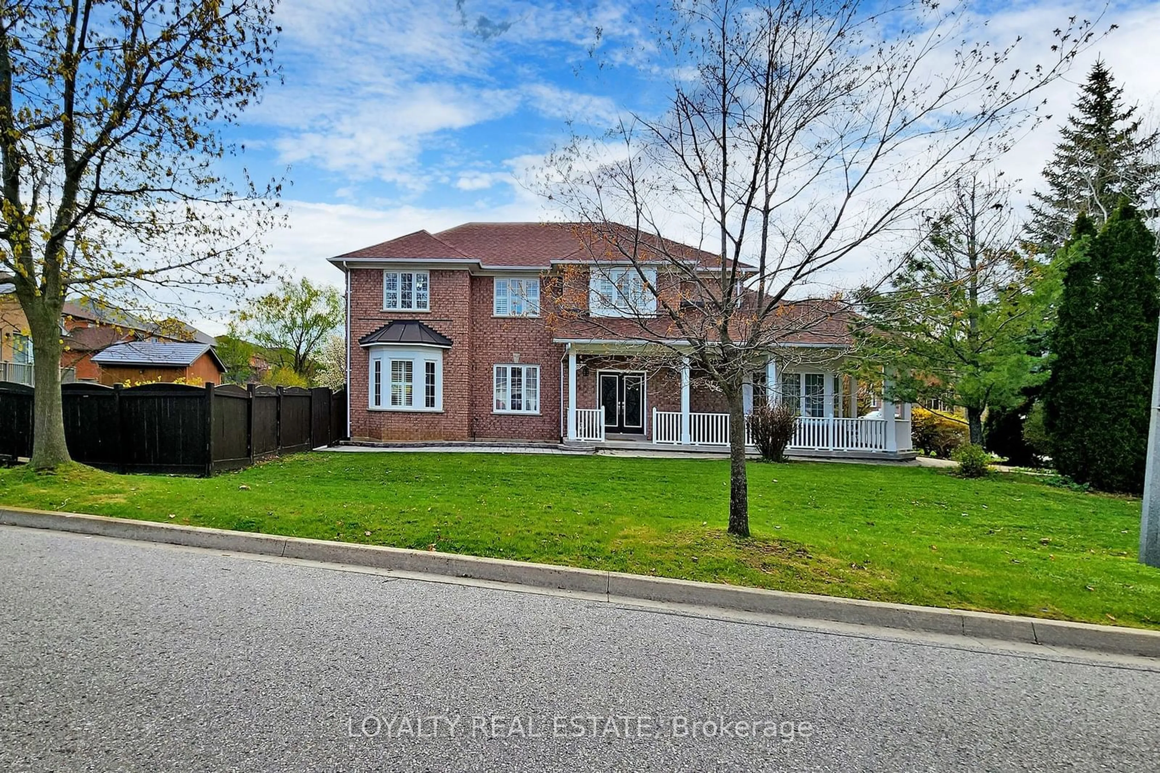 Frontside or backside of a home, the street view for 97 Song Bird Dr, Markham Ontario L3S 3T8