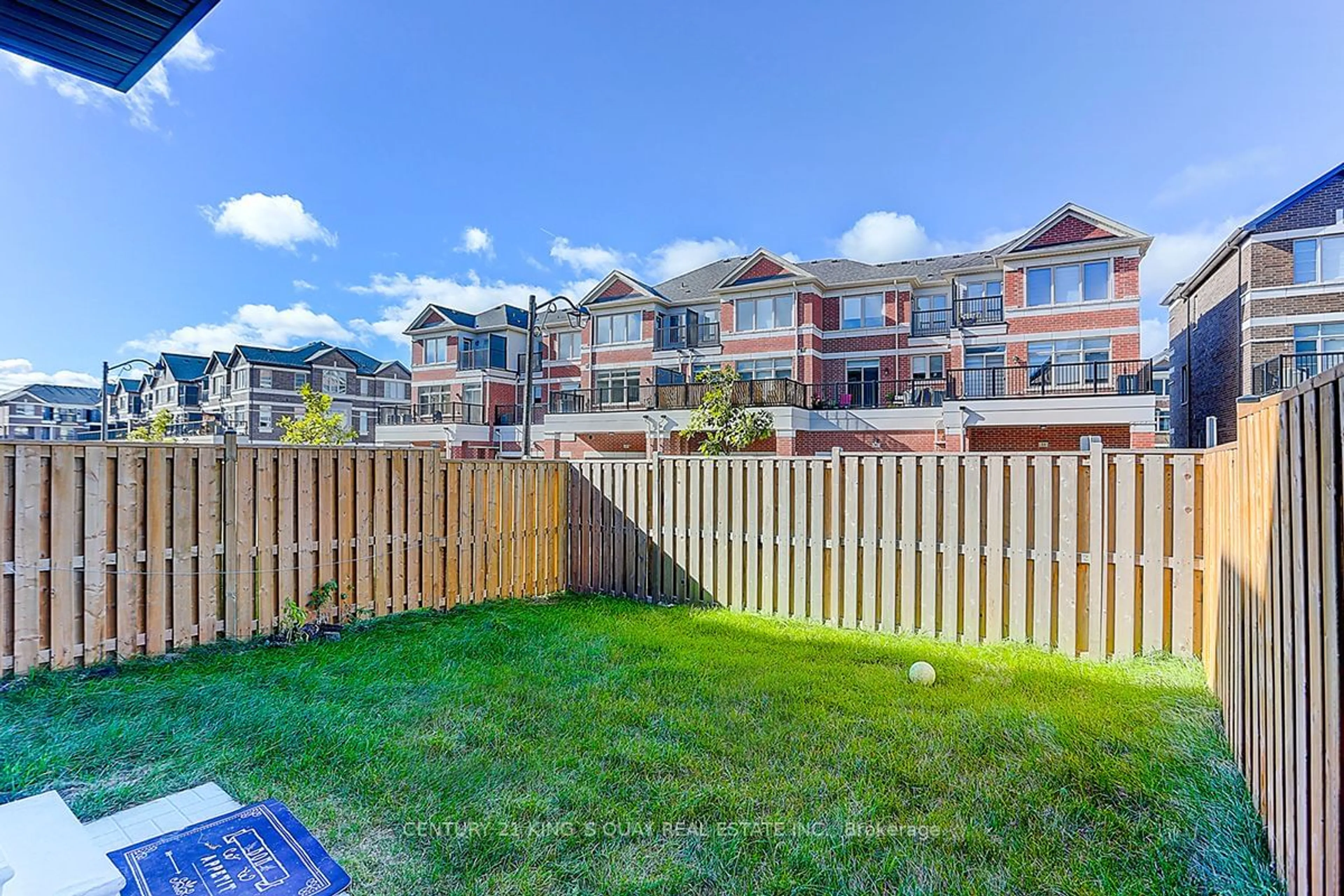 A pic from exterior of the house or condo, the fenced backyard for 34 Sissons Way, Markham Ontario L6B 1R2