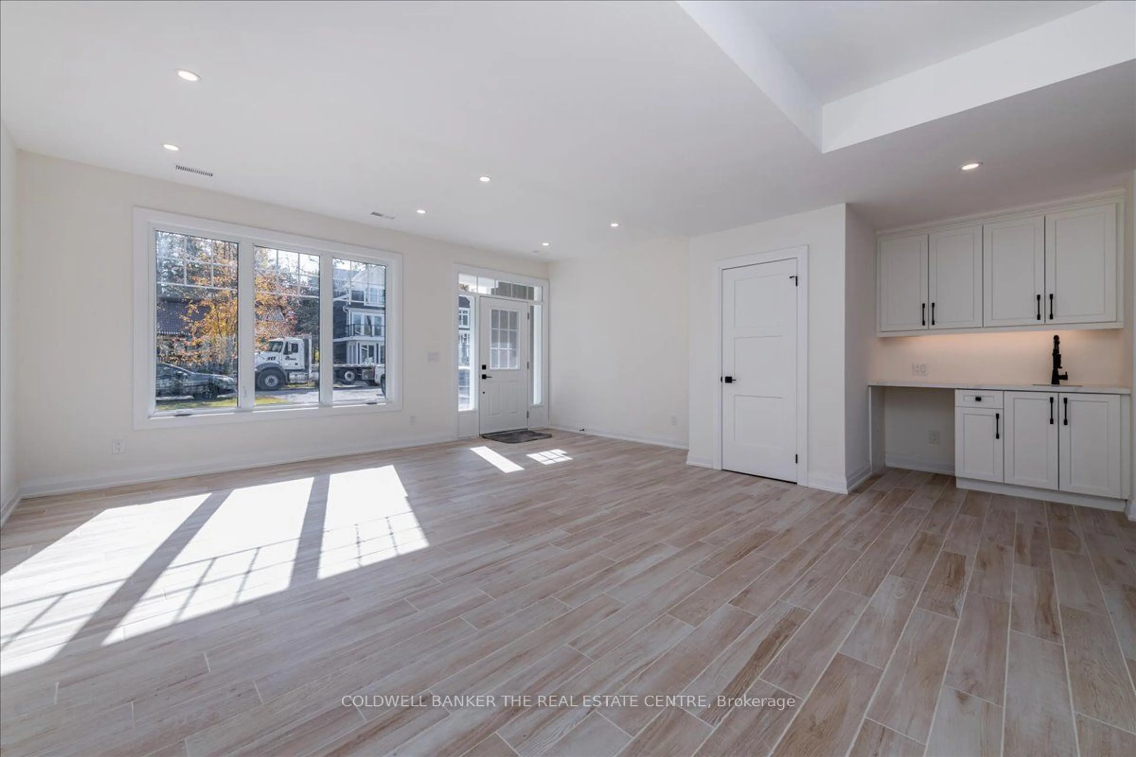 A pic of a room, wood floors for 1114 Stoney Point Rd, Innisfil Ontario L0L 1W0