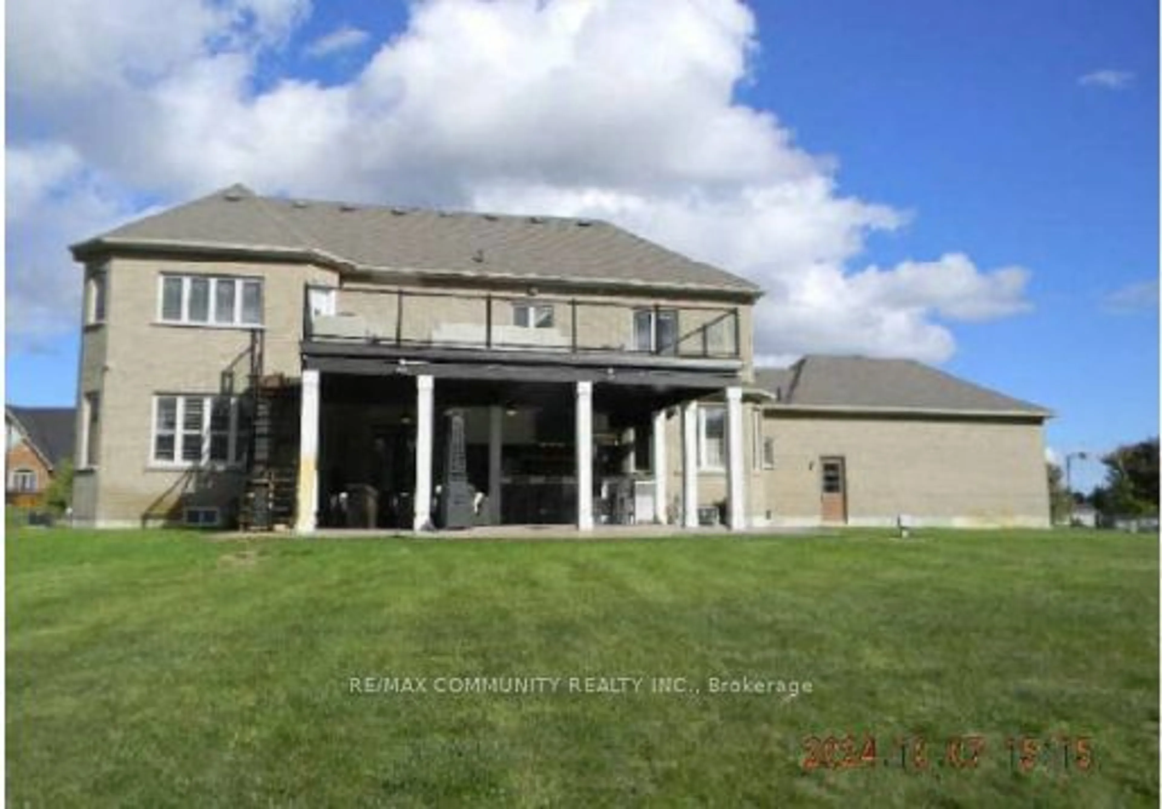 Frontside or backside of a home, the fenced backyard for 65 Ridge Rd, Uxbridge Ontario L0C 1A0