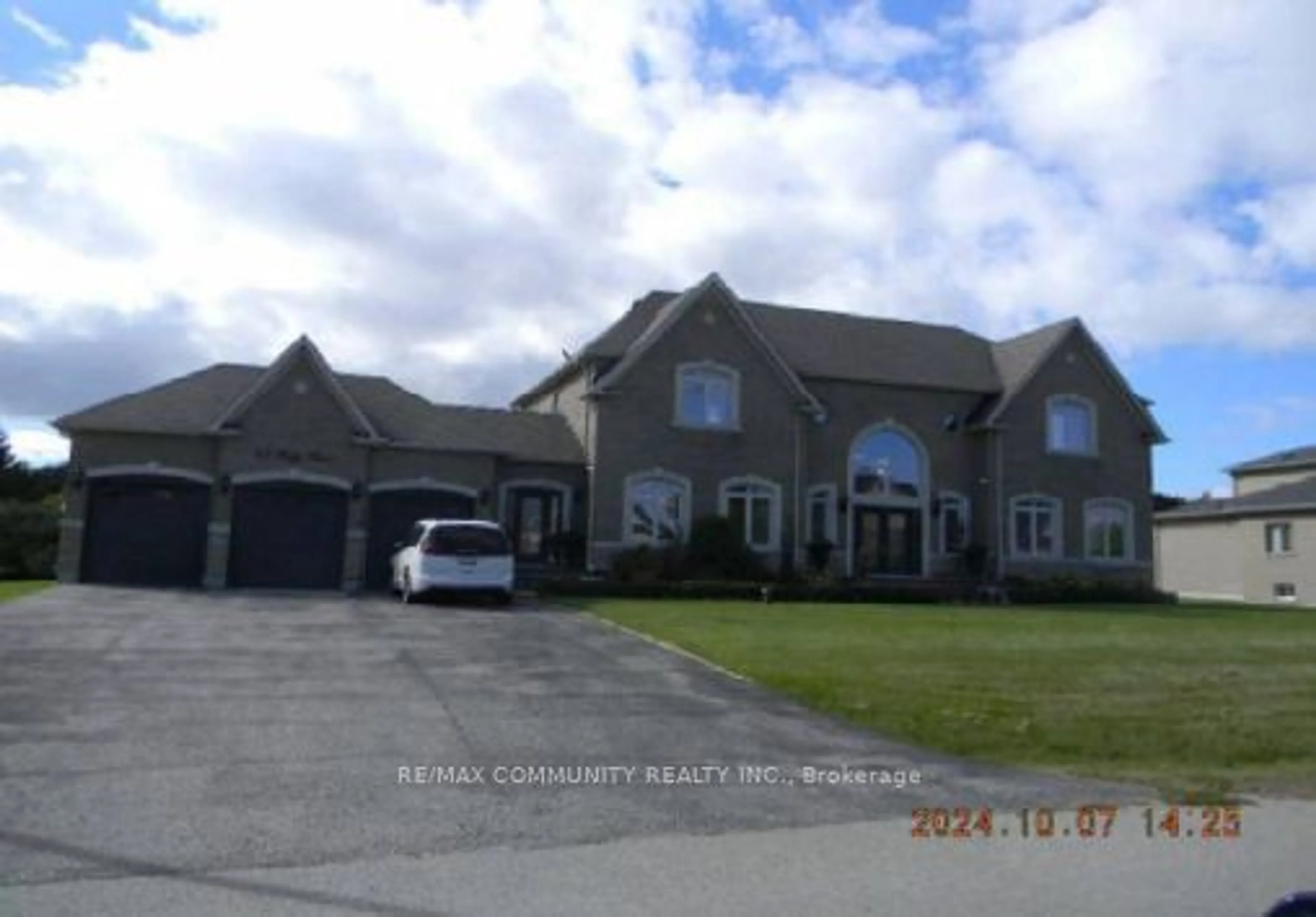 Frontside or backside of a home, the street view for 65 Ridge Rd, Uxbridge Ontario L0C 1A0