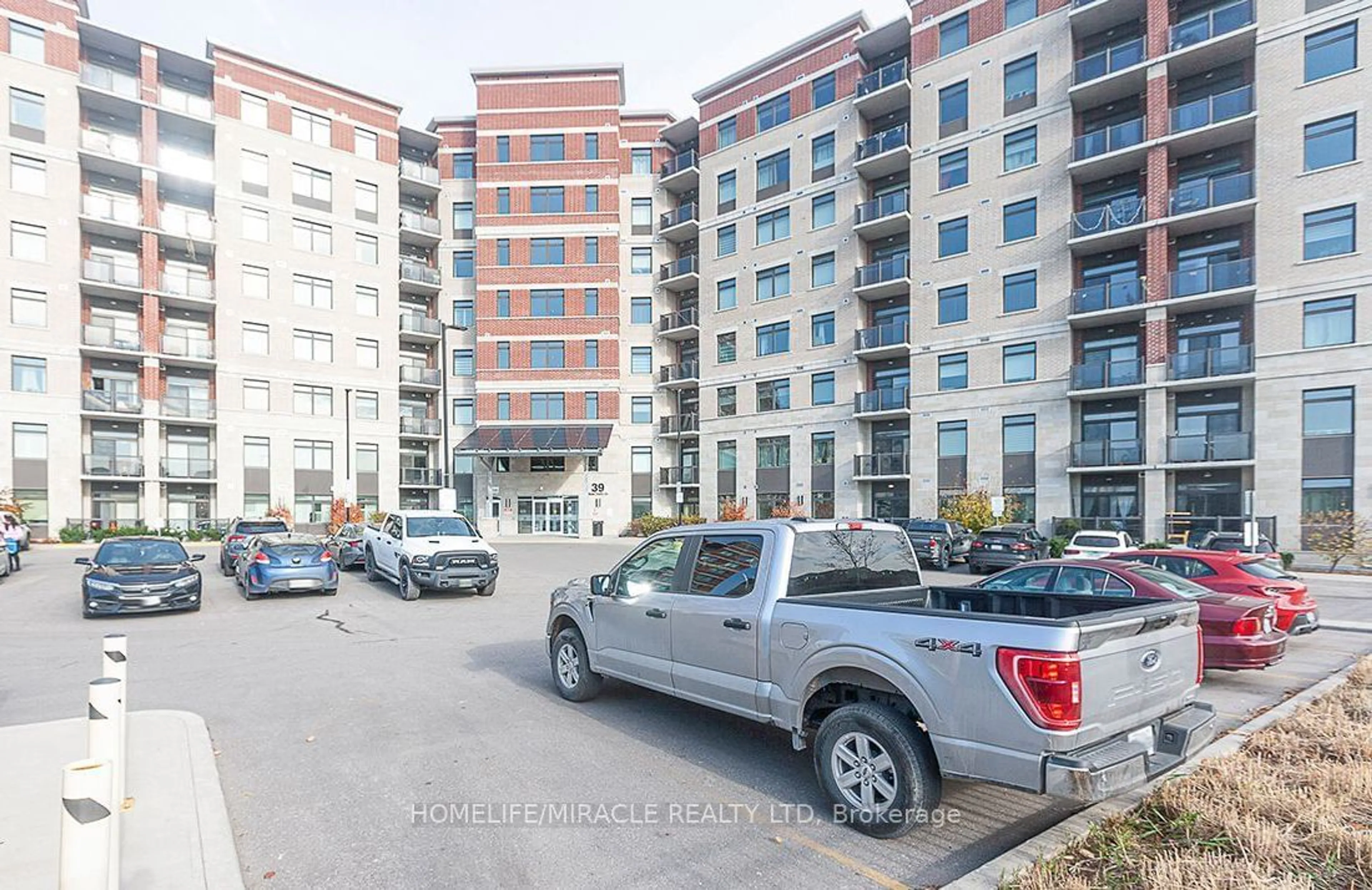 A pic from exterior of the house or condo, the street view for 39 New Delhi Dr #516, Markham Ontario L3S 0E1