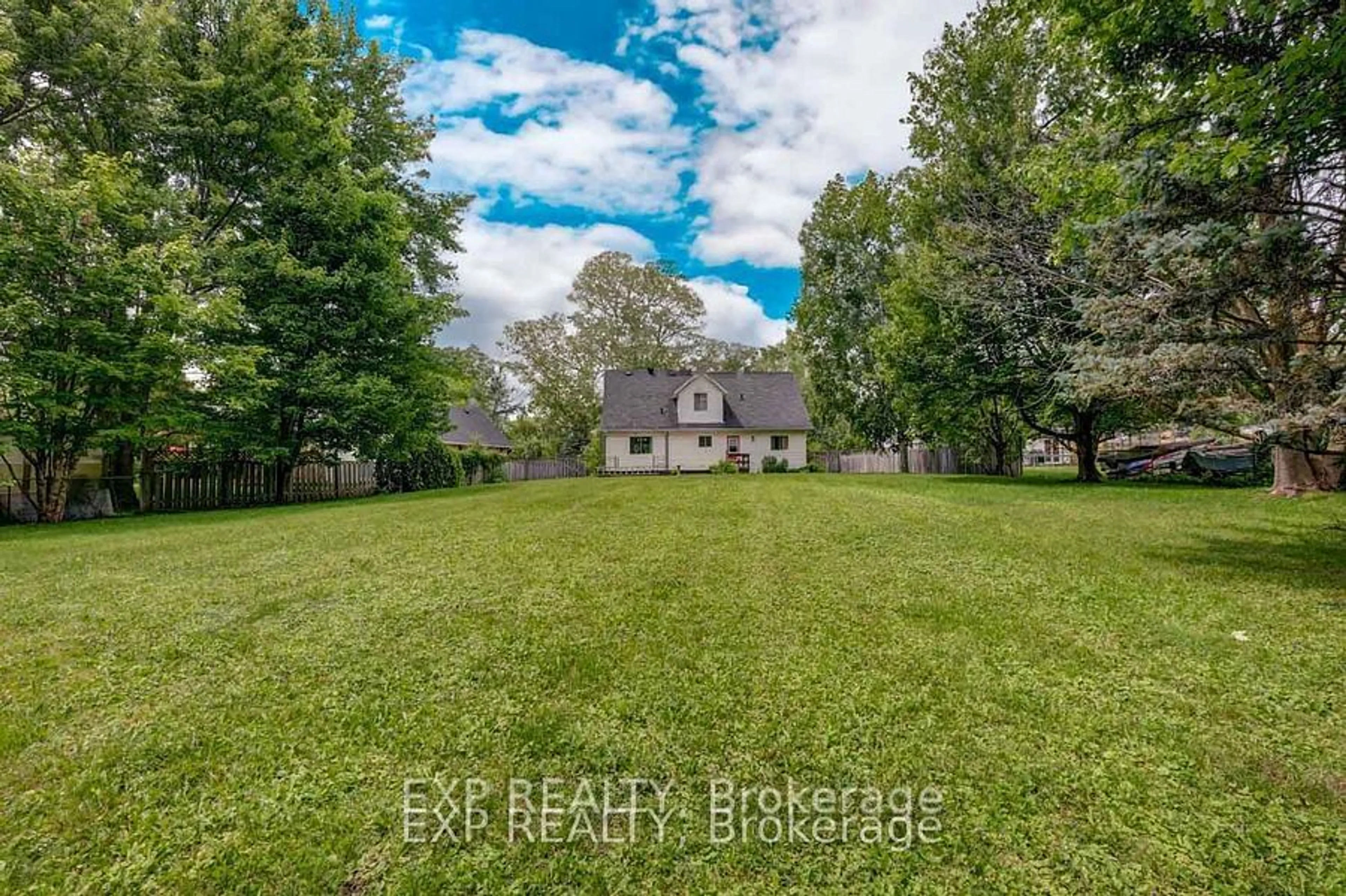 A pic from exterior of the house or condo, the fenced backyard for 2200 Richardson St, Innisfil Ontario L9S 1G5