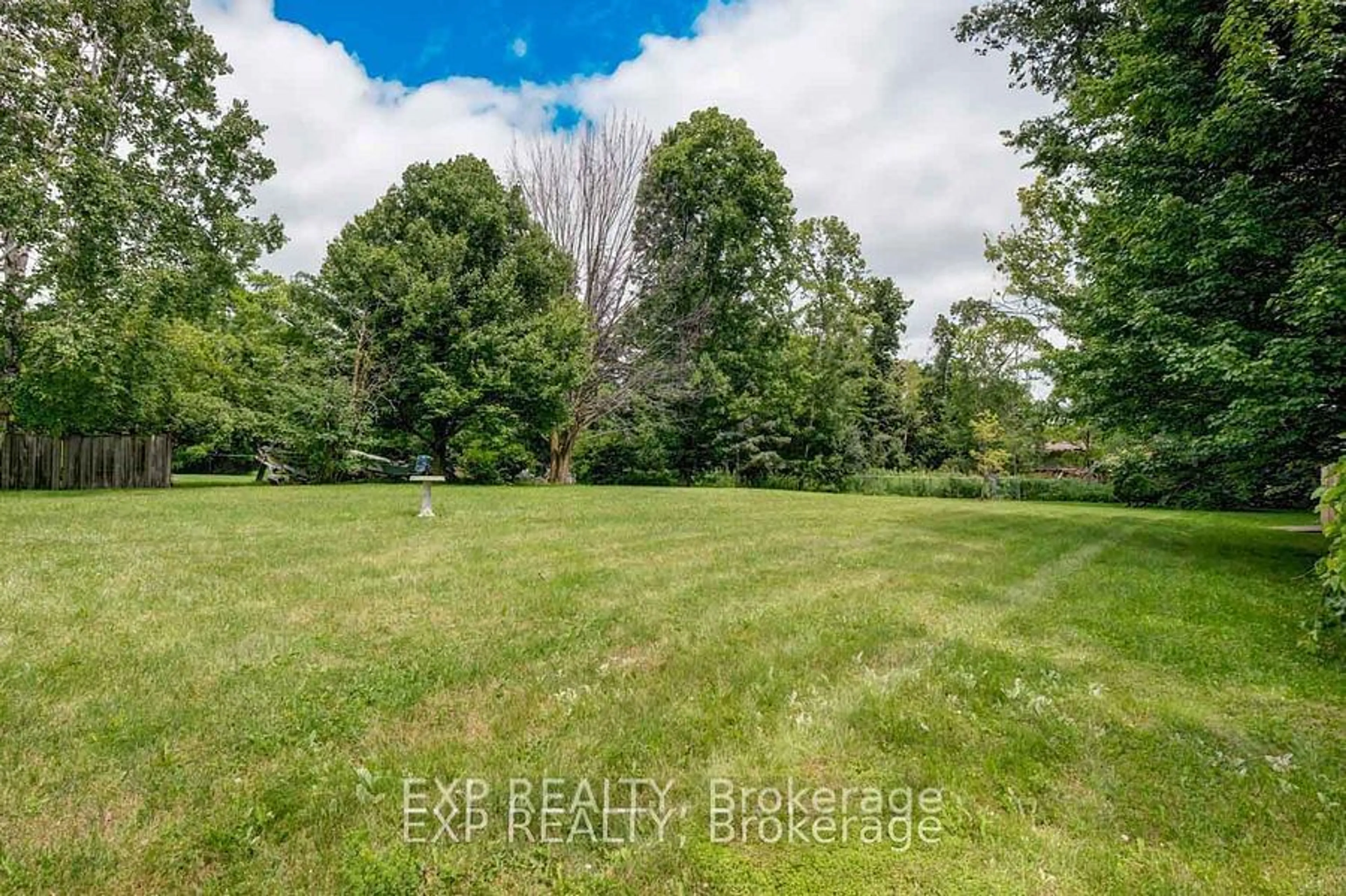 A pic from exterior of the house or condo, the fenced backyard for 2200 Richardson St, Innisfil Ontario L9S 1G5