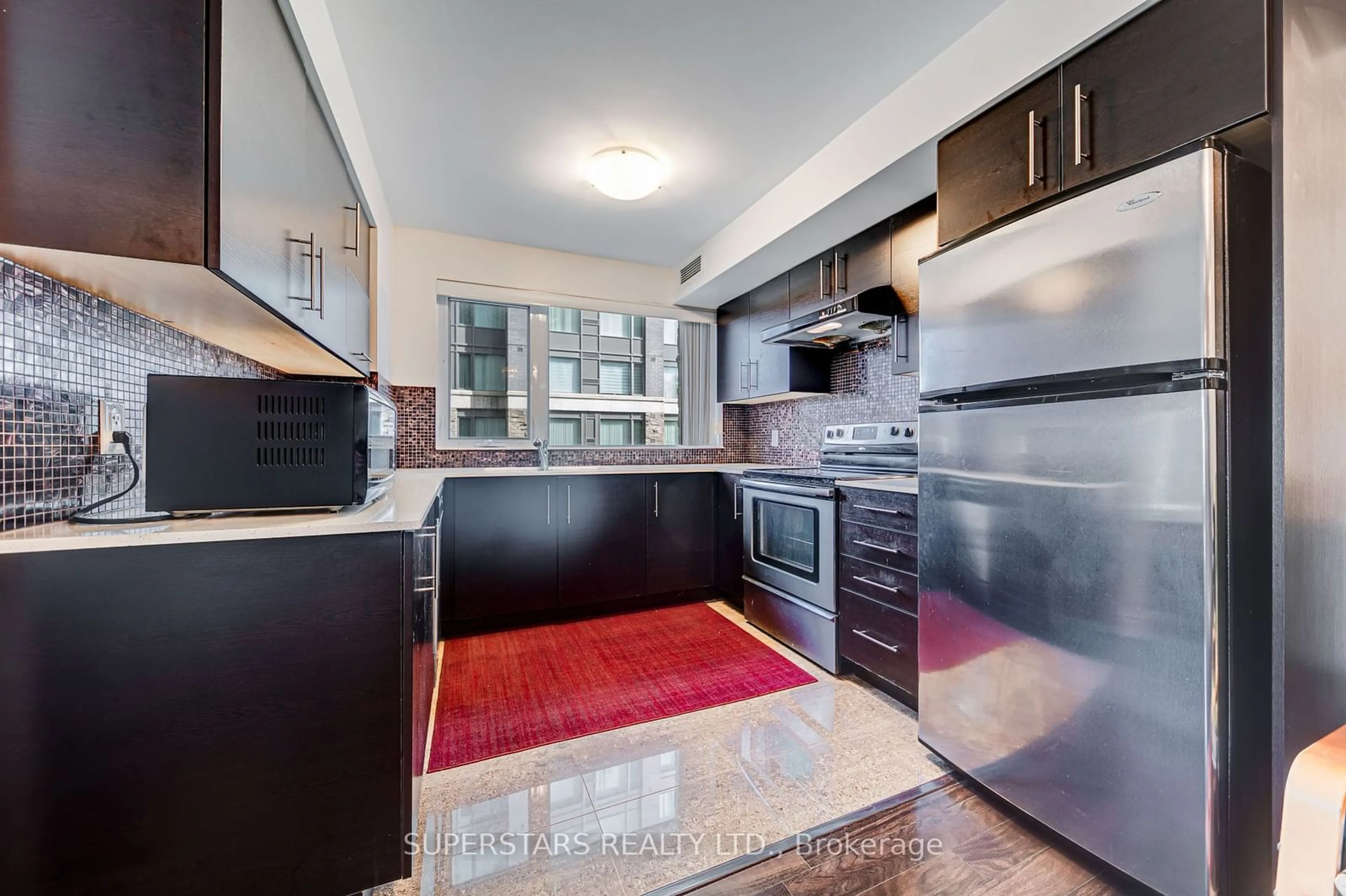 Standard kitchen, wood floors for 273 South Park Rd #206, Markham Ontario L3T 0B5