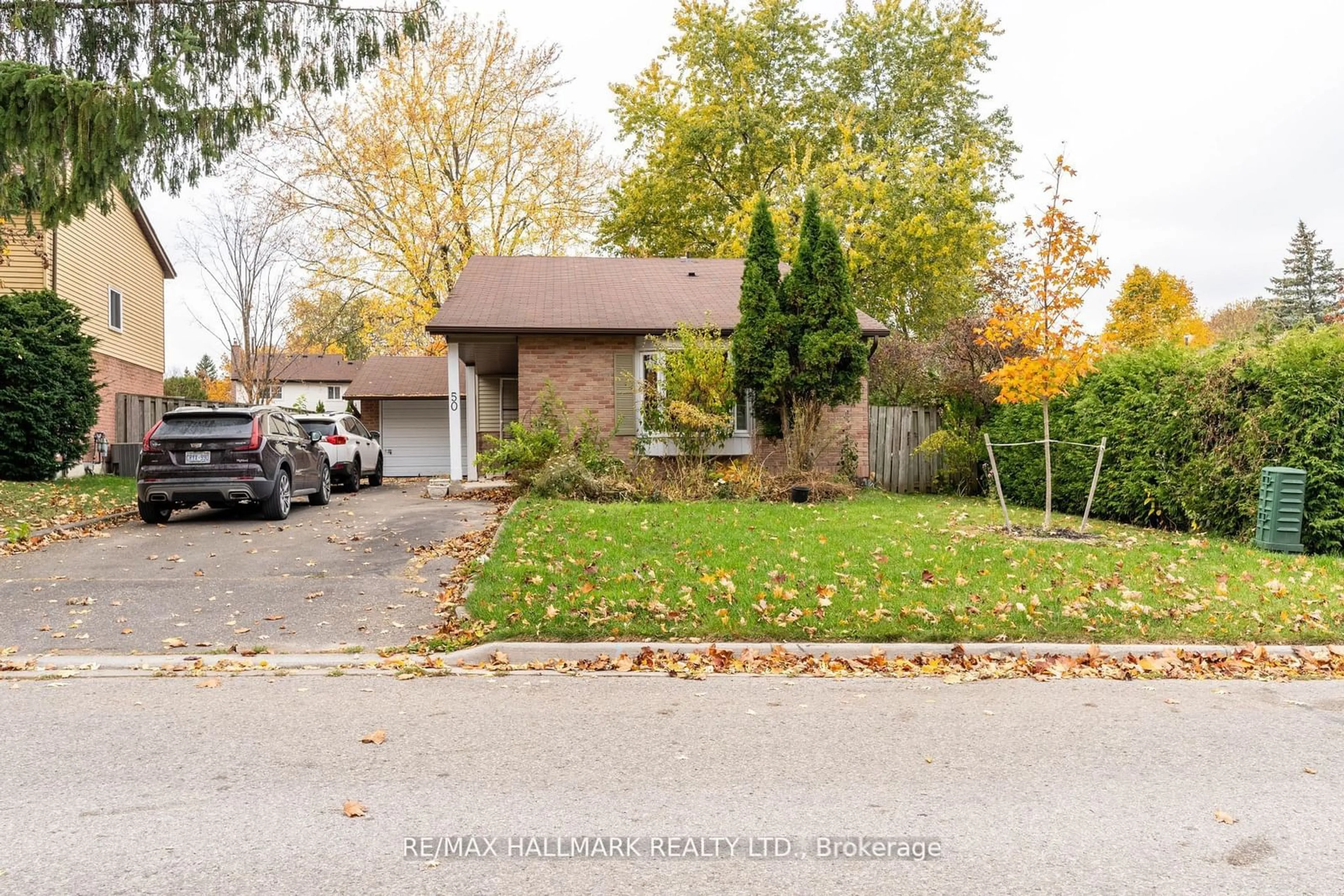 Frontside or backside of a home, the street view for 50 Stoddart Dr, Aurora Ontario L4G 2G3