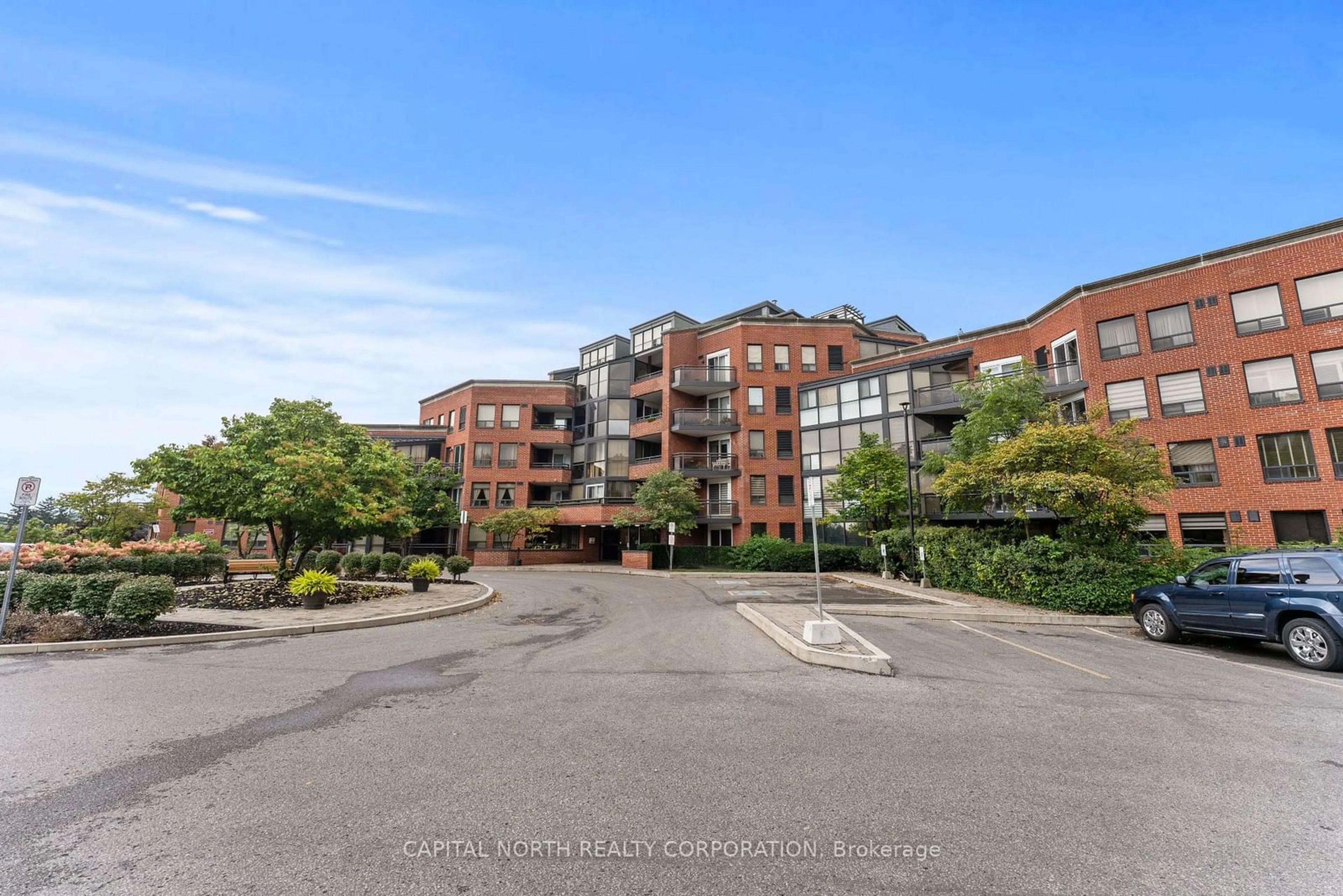 A pic from exterior of the house or condo, the front or back of building for 100 Arbors Lane #319, Vaughan Ontario L4L 7G4