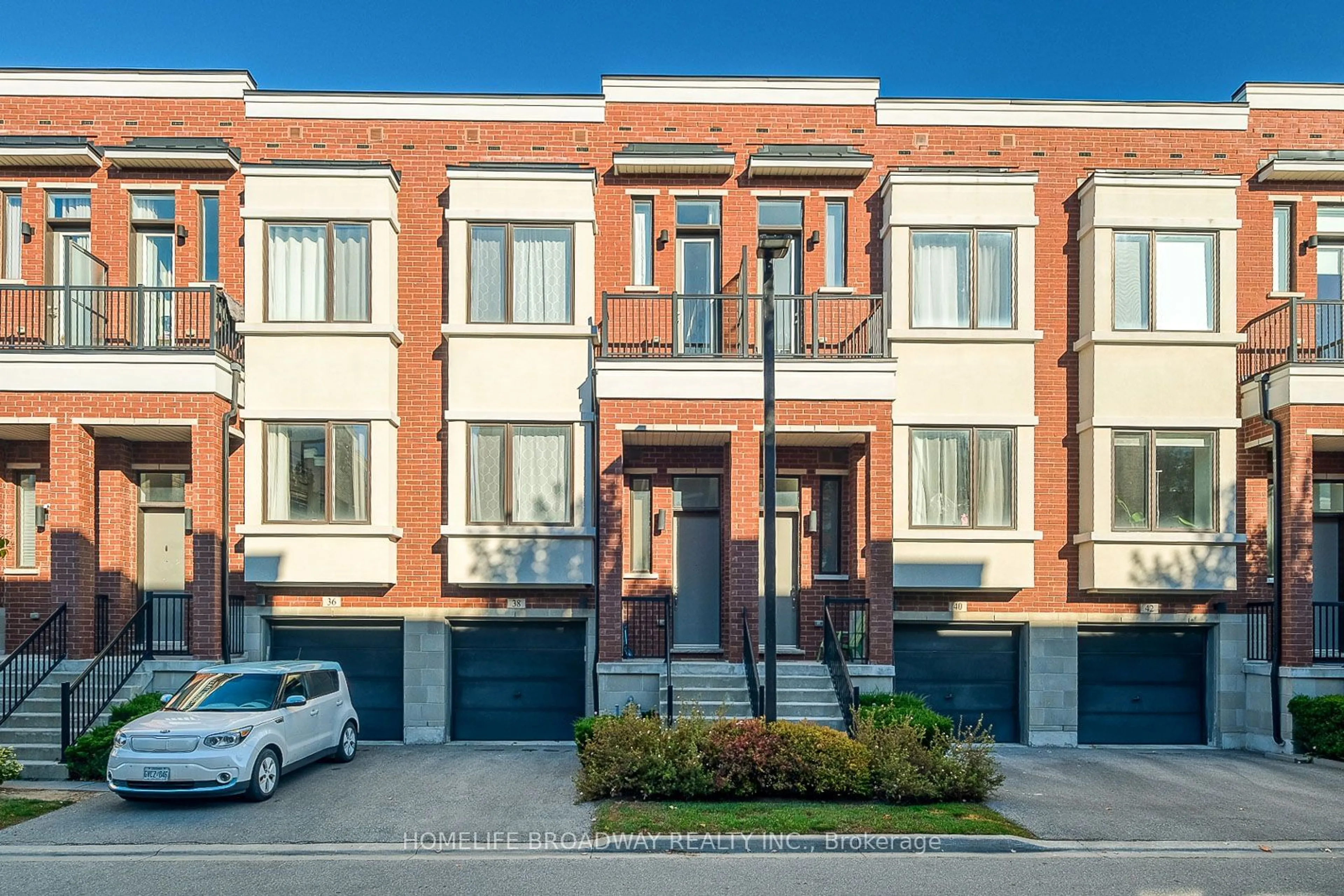 A pic from exterior of the house or condo, the front or back of building for 38 Lafferty Lane, Richmond Hill Ontario L4C 0Z8