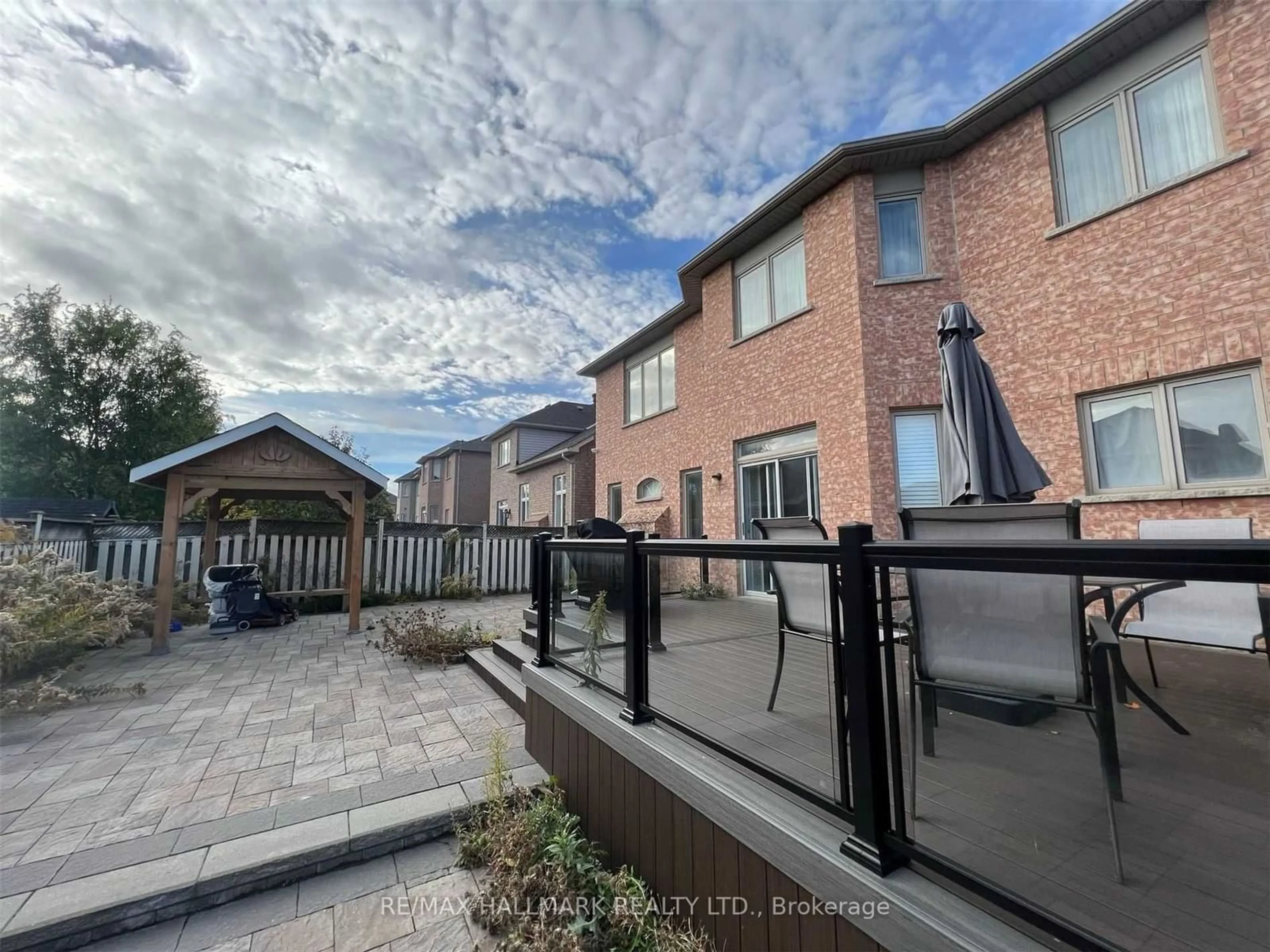 Patio, the fenced backyard for 47 Eakin Mill Rd, Markham Ontario L6E 1M5