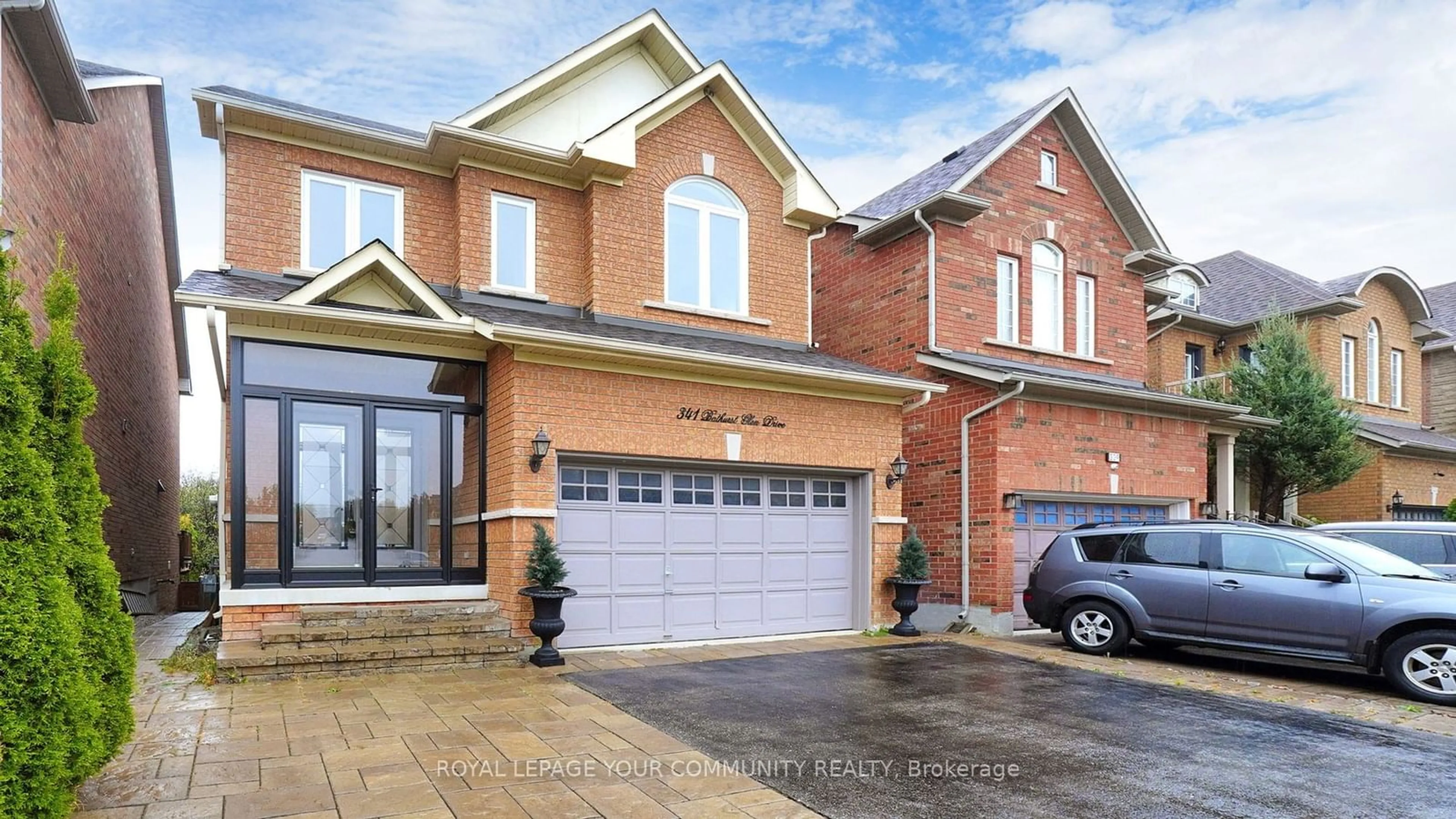 Home with brick exterior material for 341 Bathurst Glen Dr, Vaughan Ontario L4J 9A3