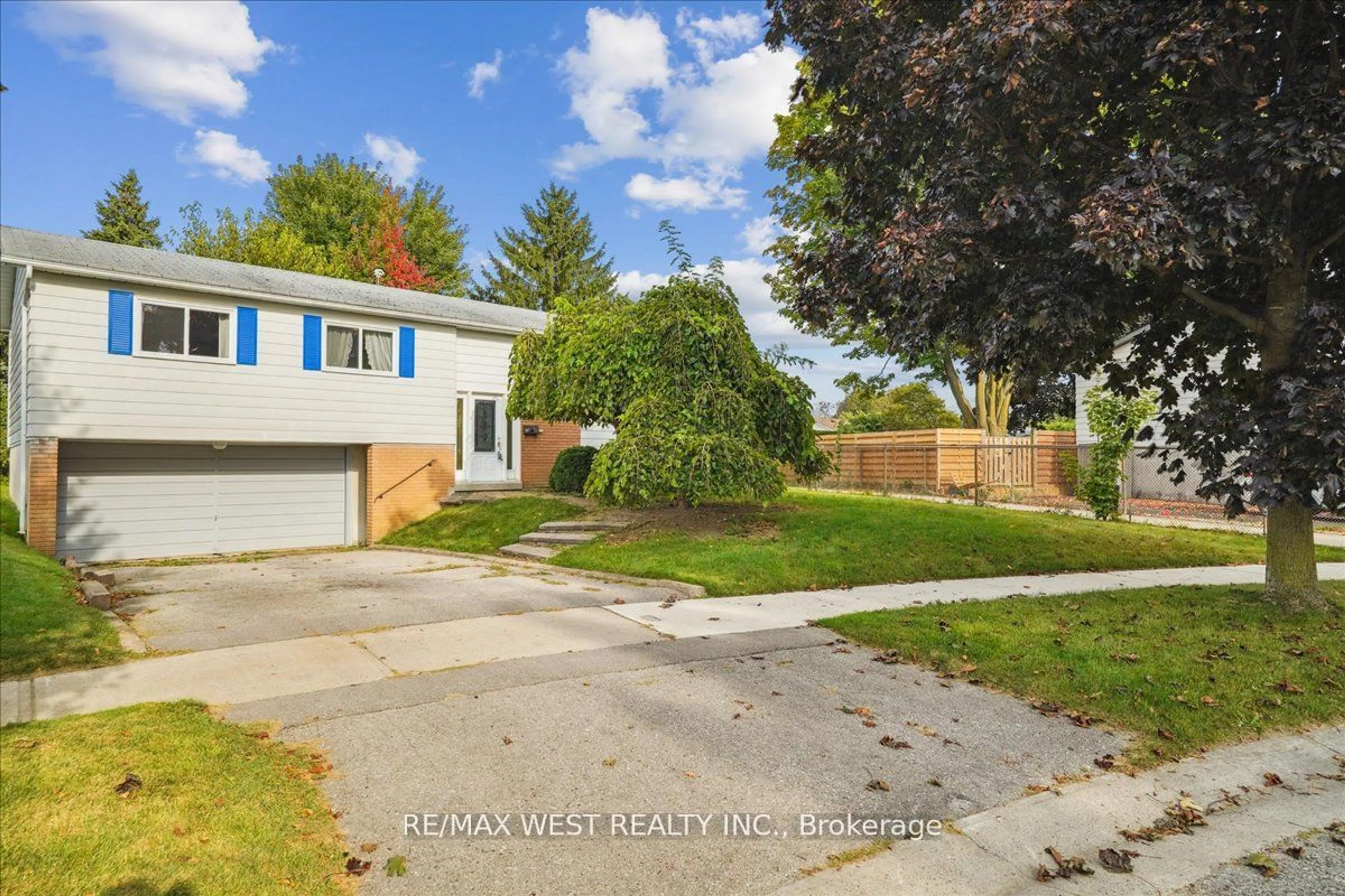 Frontside or backside of a home, the fenced backyard for 31 Sir Caradoc Pl, Markham Ontario L3P 2X5