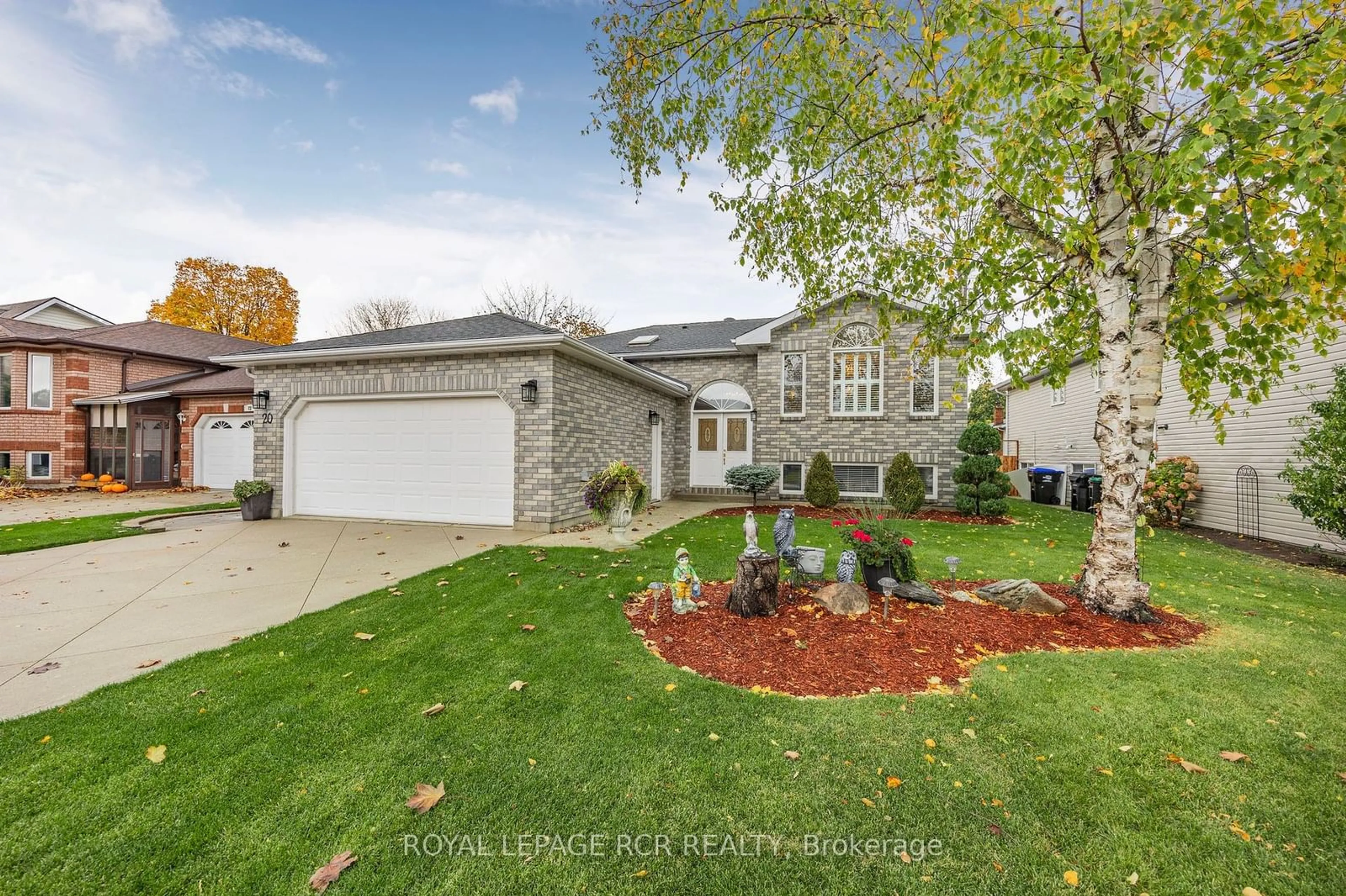 Frontside or backside of a home, the fenced backyard for 20 Riverdale Dr, Wasaga Beach Ontario L9Z 1E9