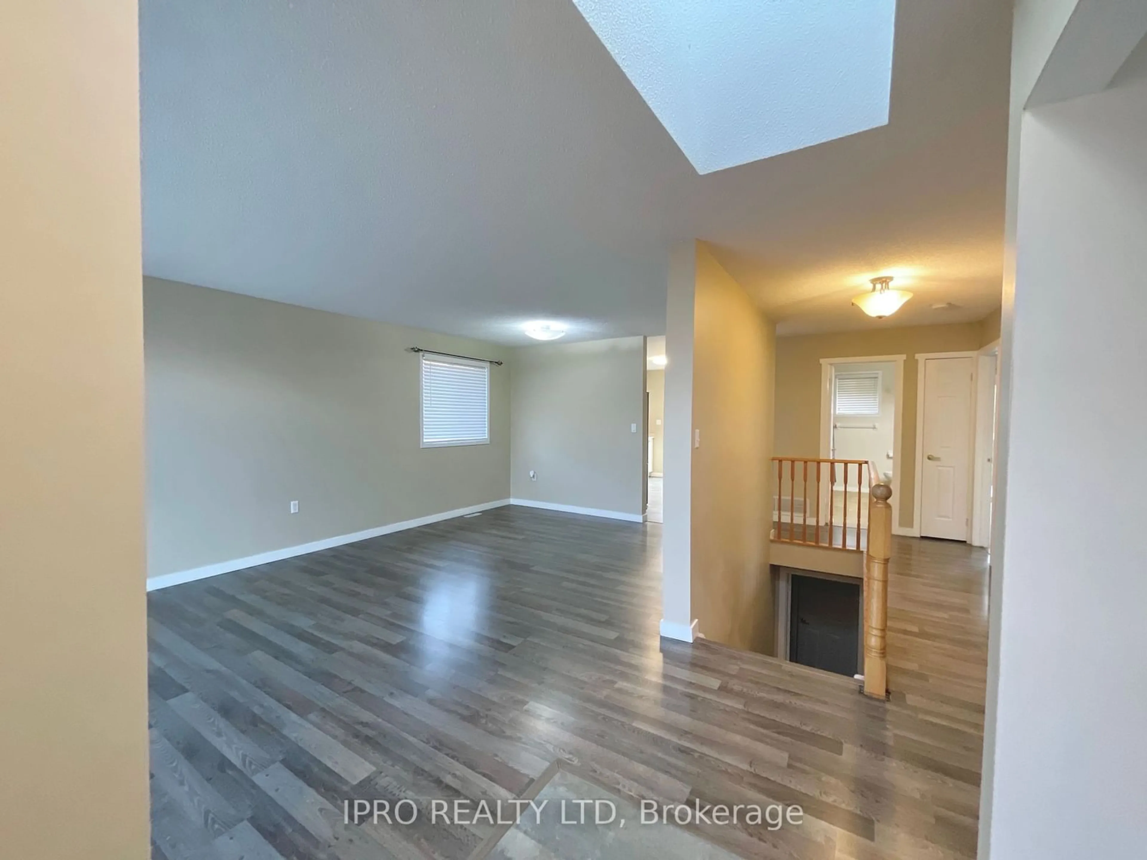 A pic of a room, wood floors for 23 Garibaldi Dr, Barrie Ontario L4N 8C3