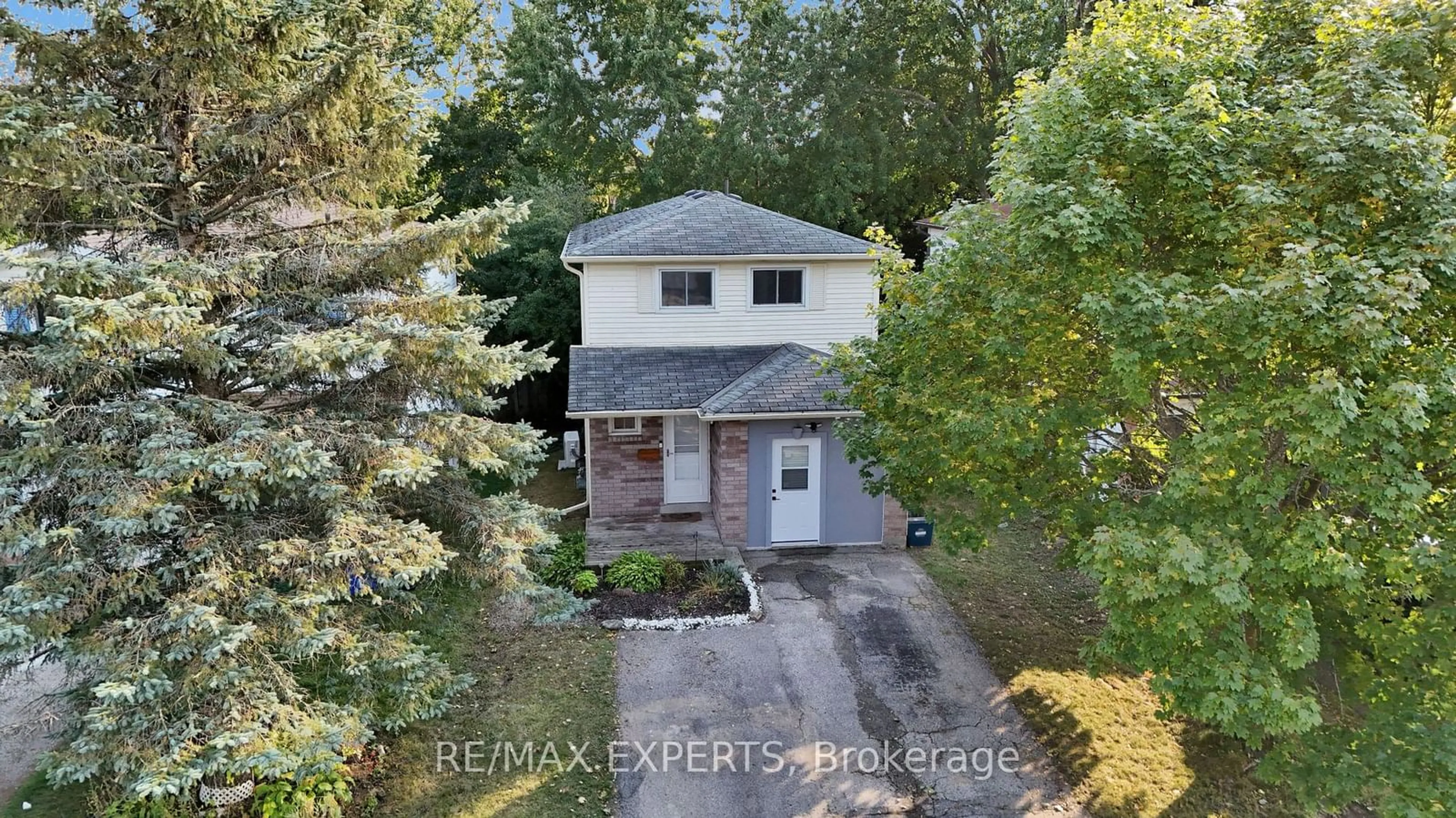 Frontside or backside of a home, the fenced backyard for 79 Corbett Dr, Barrie Ontario L4M 5V5