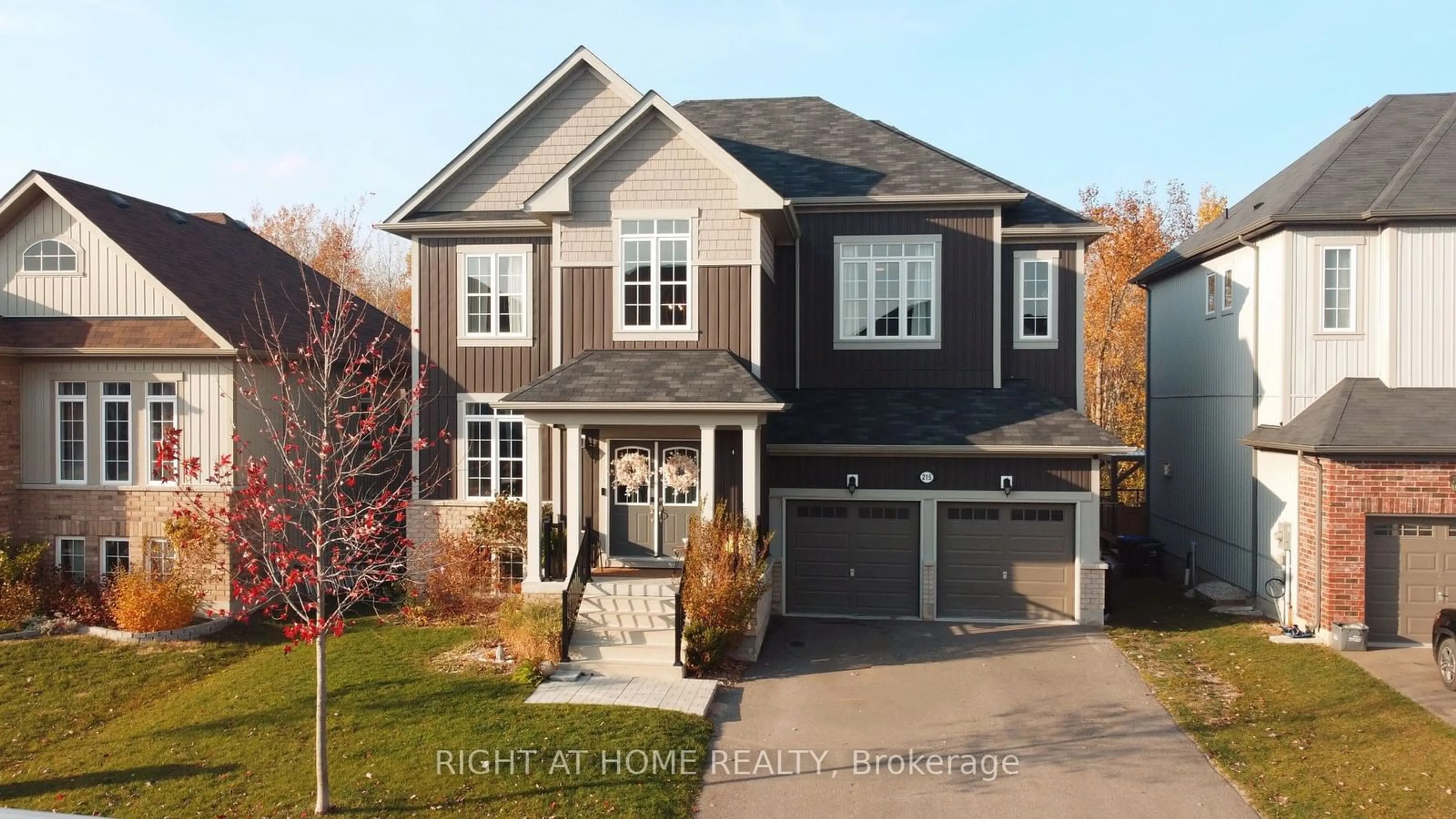 Frontside or backside of a home, the street view for 215 Roy Dr, Clearview Ontario L0M 1S0