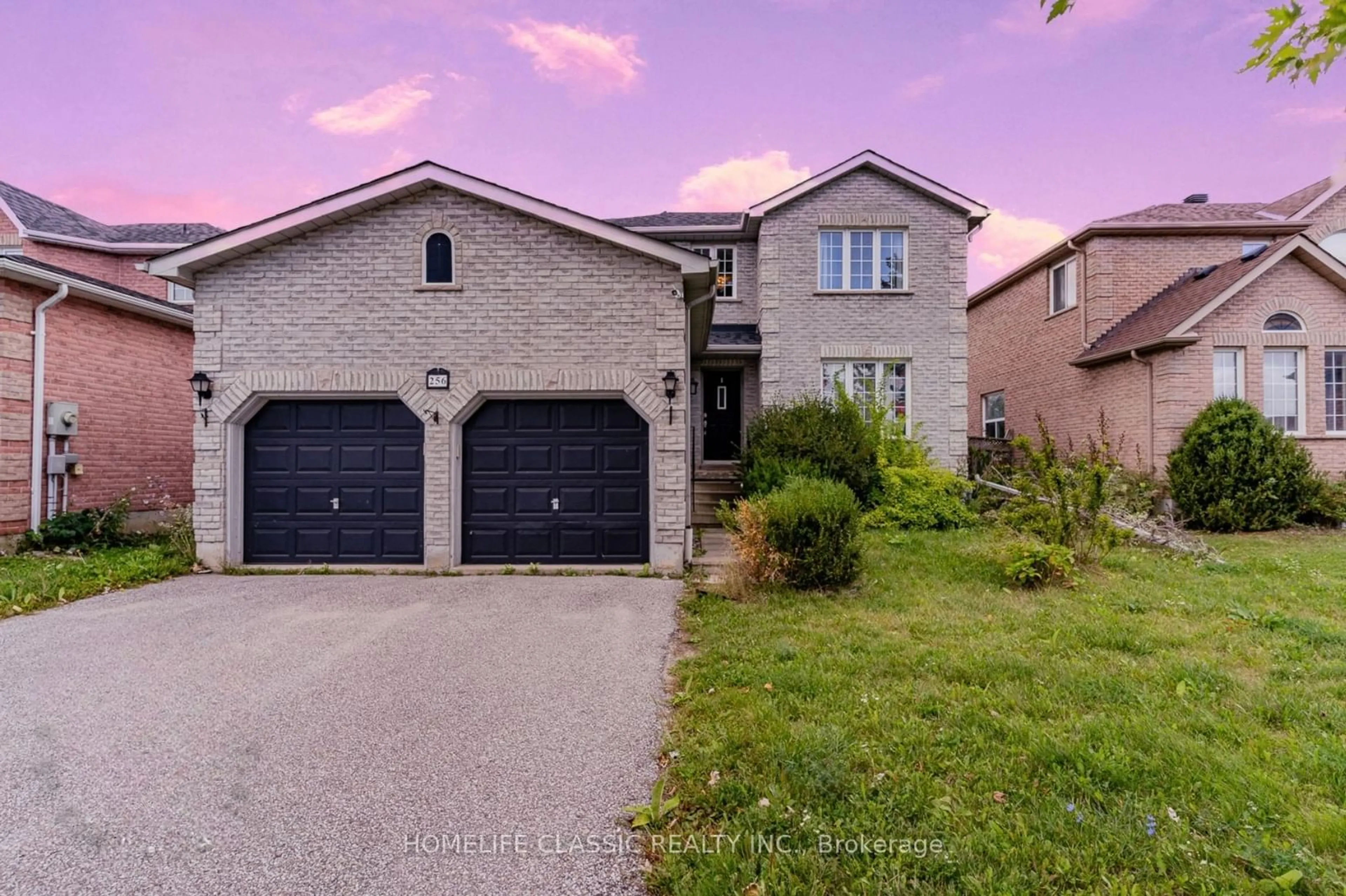 Frontside or backside of a home, the street view for 256 Johnson St, Barrie Ontario L4M 6S2