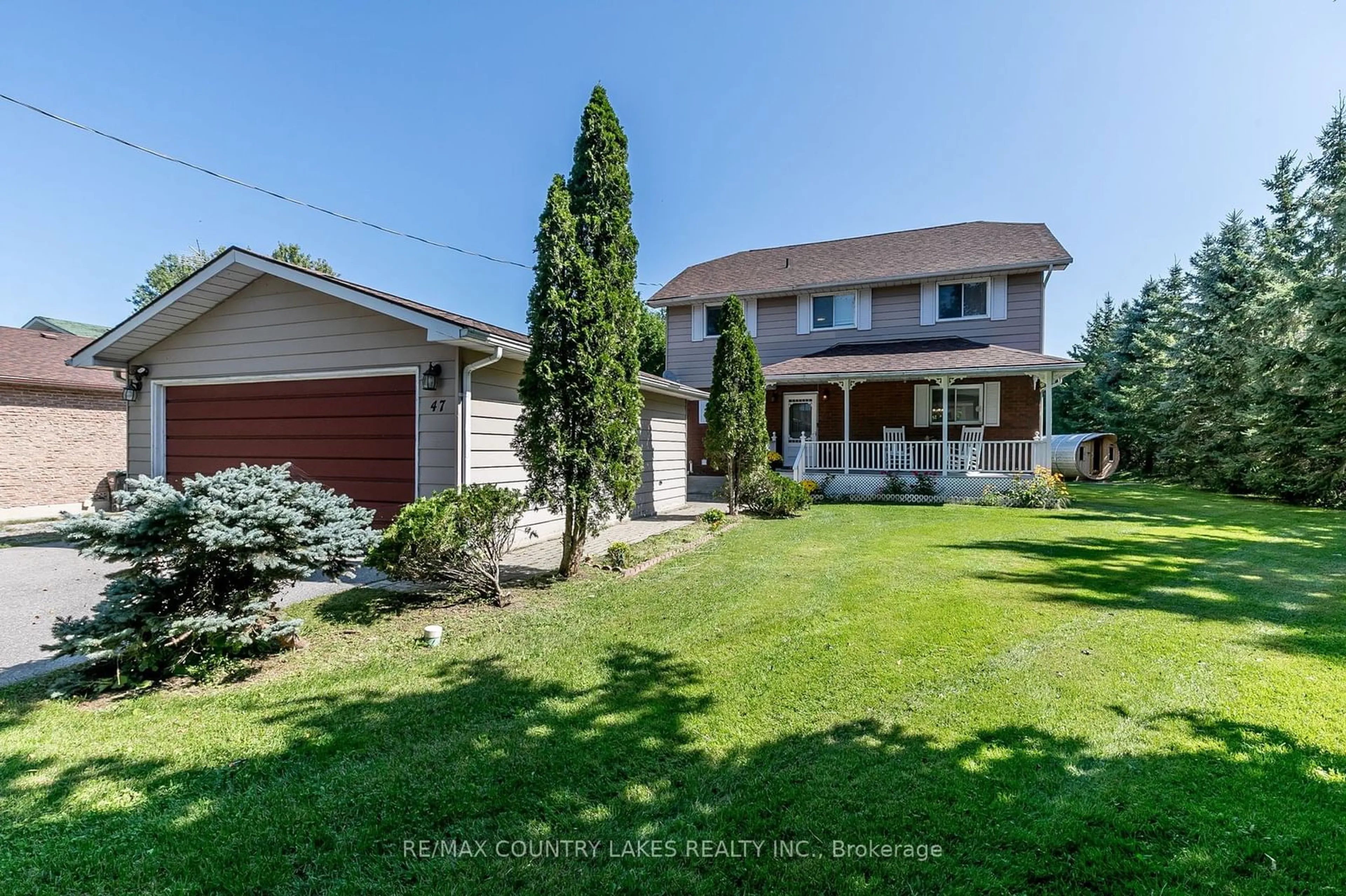 Frontside or backside of a home, the fenced backyard for 47 Lake Ave, Ramara Ontario L0K 1B0