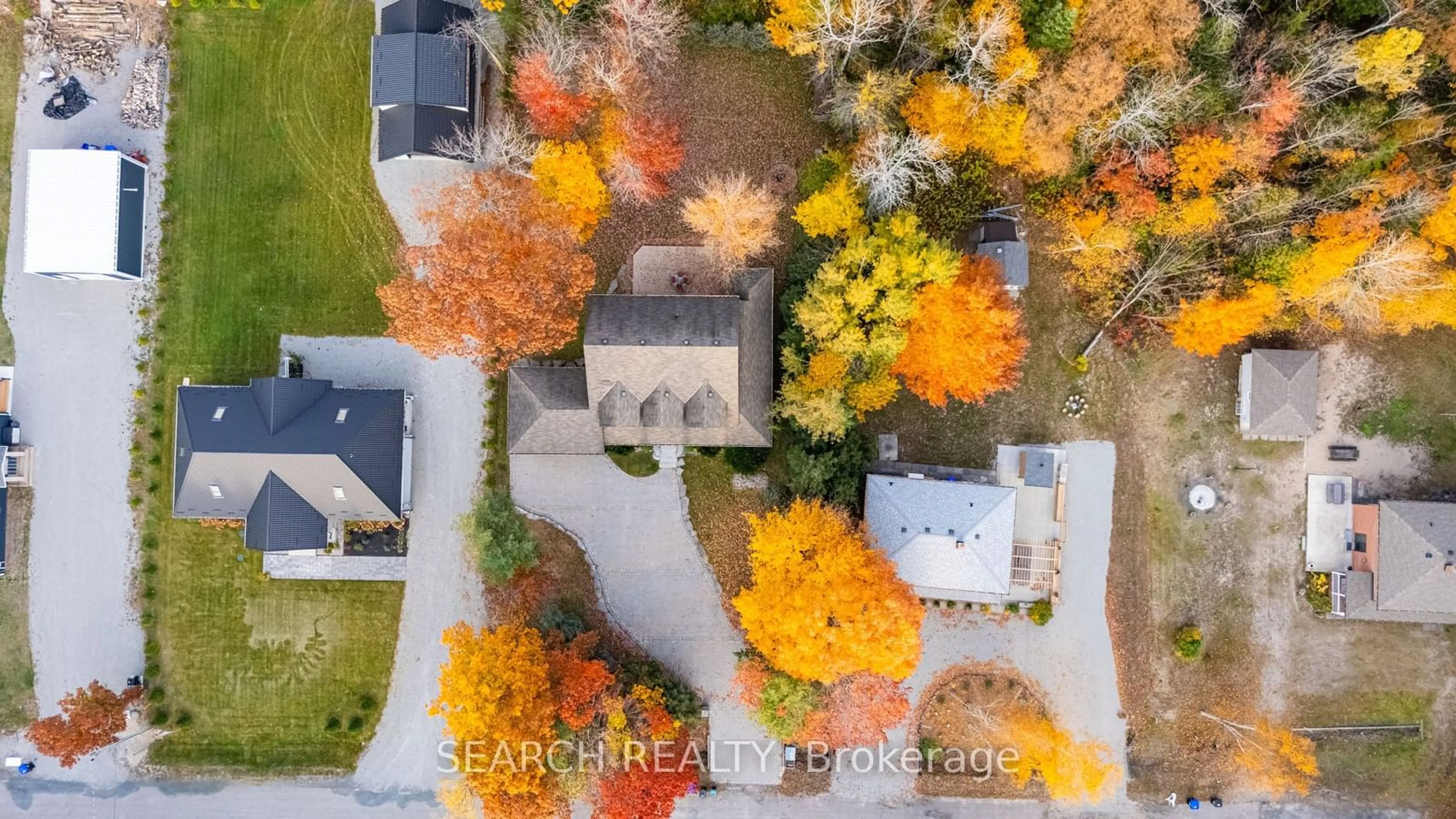 A pic from exterior of the house or condo, the street view for 57 Old Trail Dr, Tiny Ontario L0L 2T0