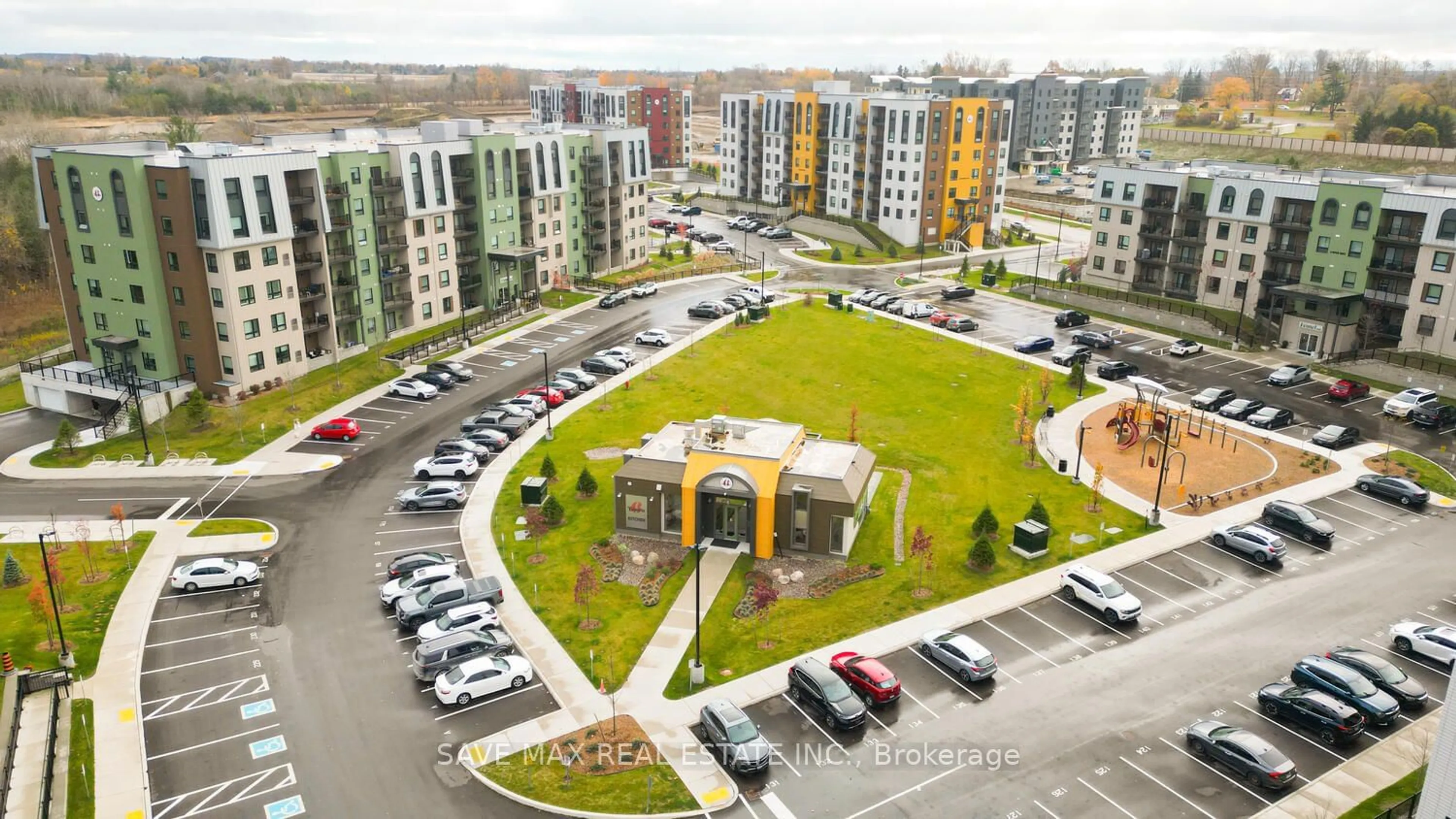 A pic from exterior of the house or condo, the view of city buildings for 5 Chef Lane #101, Barrie Ontario L9J 0J8