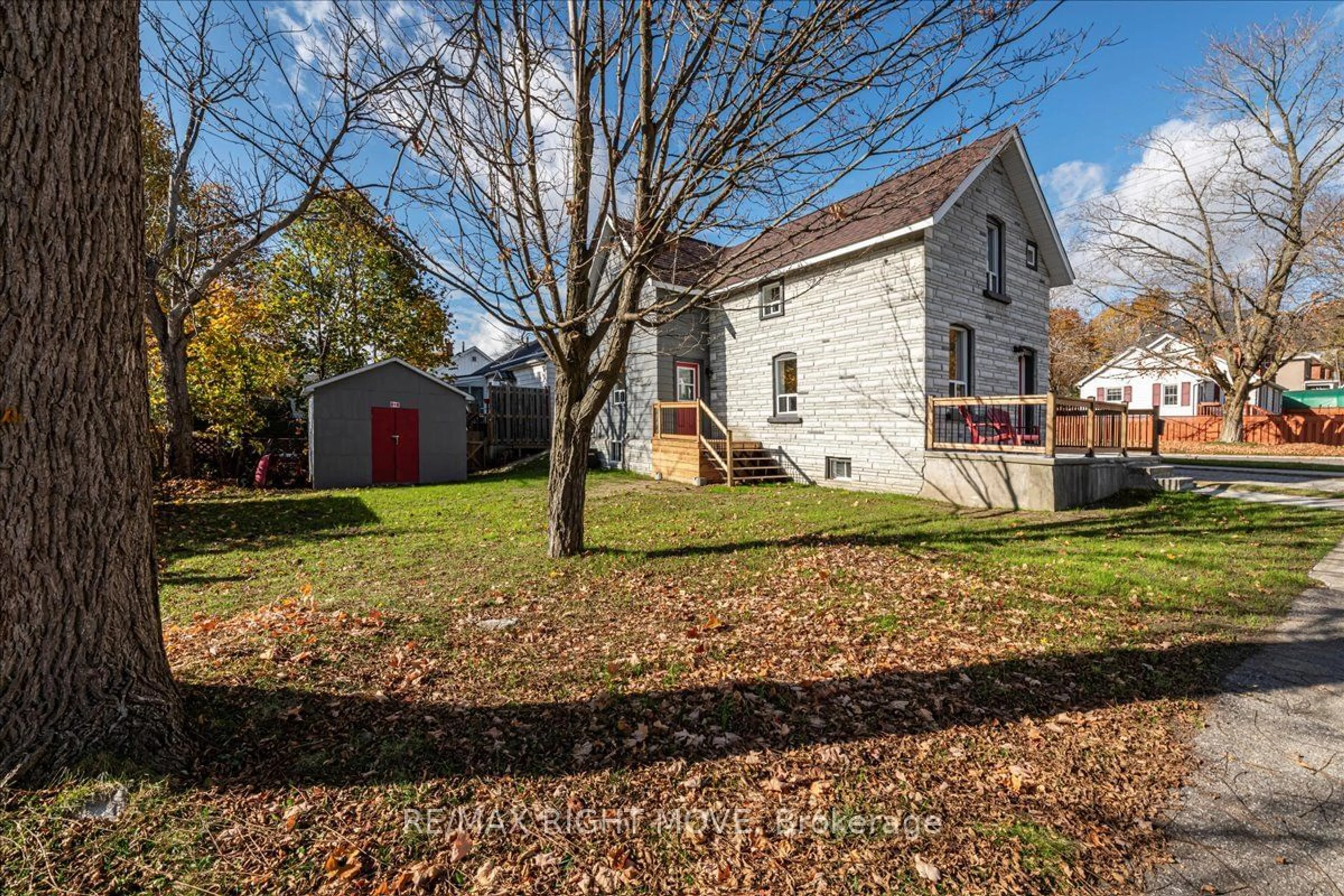 Frontside or backside of a home, the fenced backyard for 89 Douglas St, Orillia Ontario L3V 5Y7