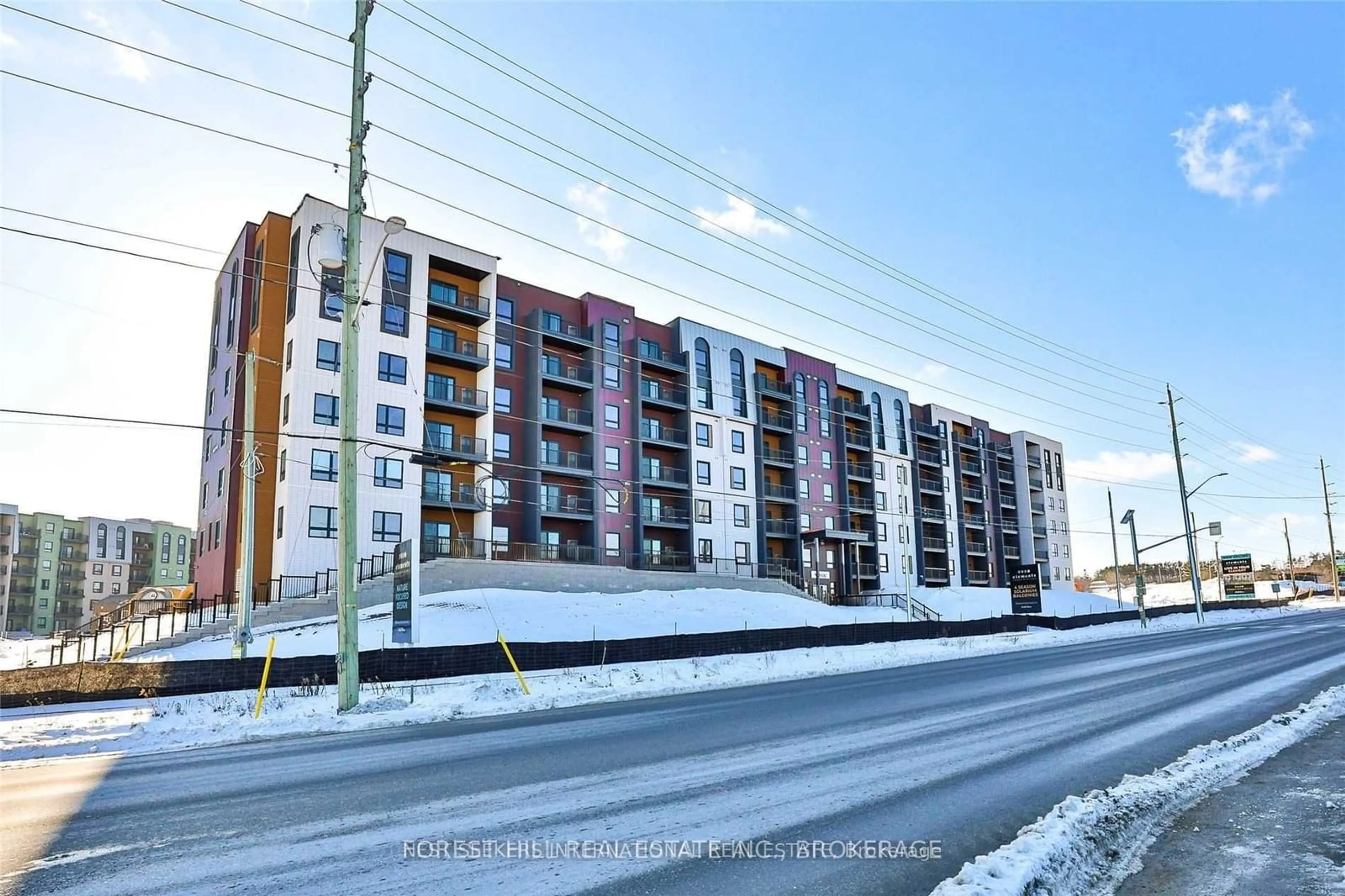 A pic from exterior of the house or condo, the street view for 4 Spice Way #308, Barrie Ontario L9J 0M2