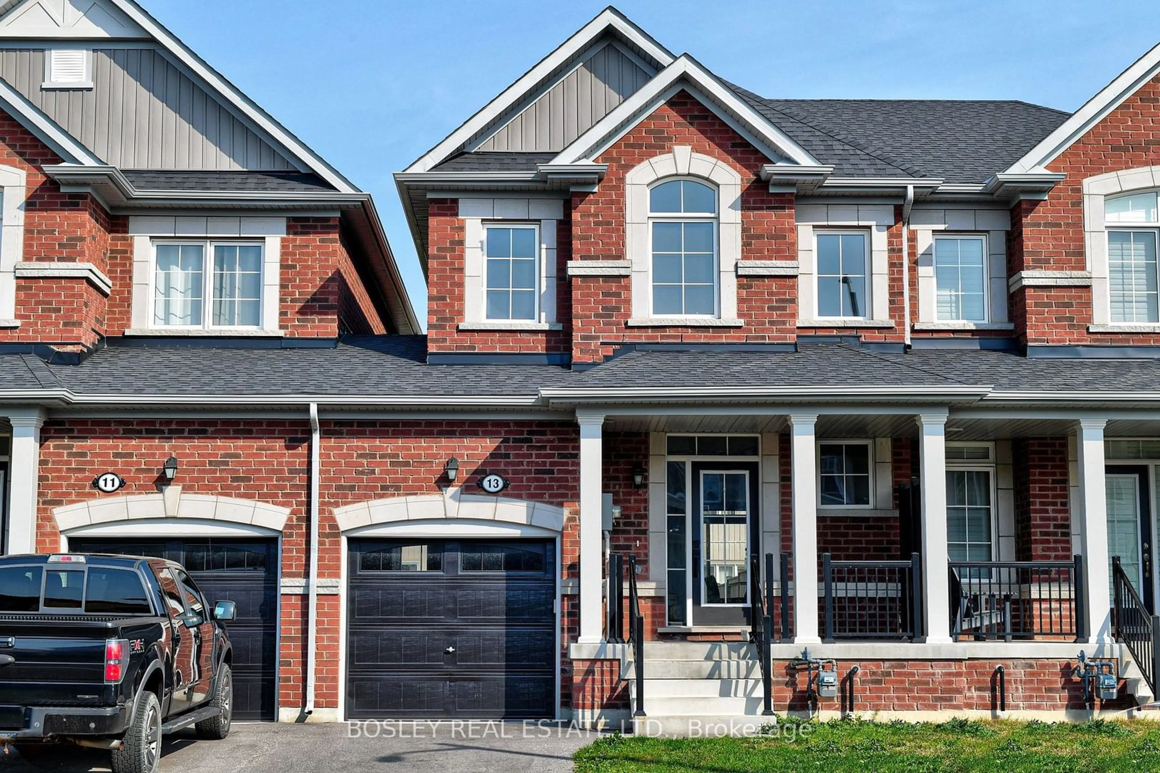 Home with brick exterior material for 13 Barfoot St, Collingwood Ontario L9Y 3Y7