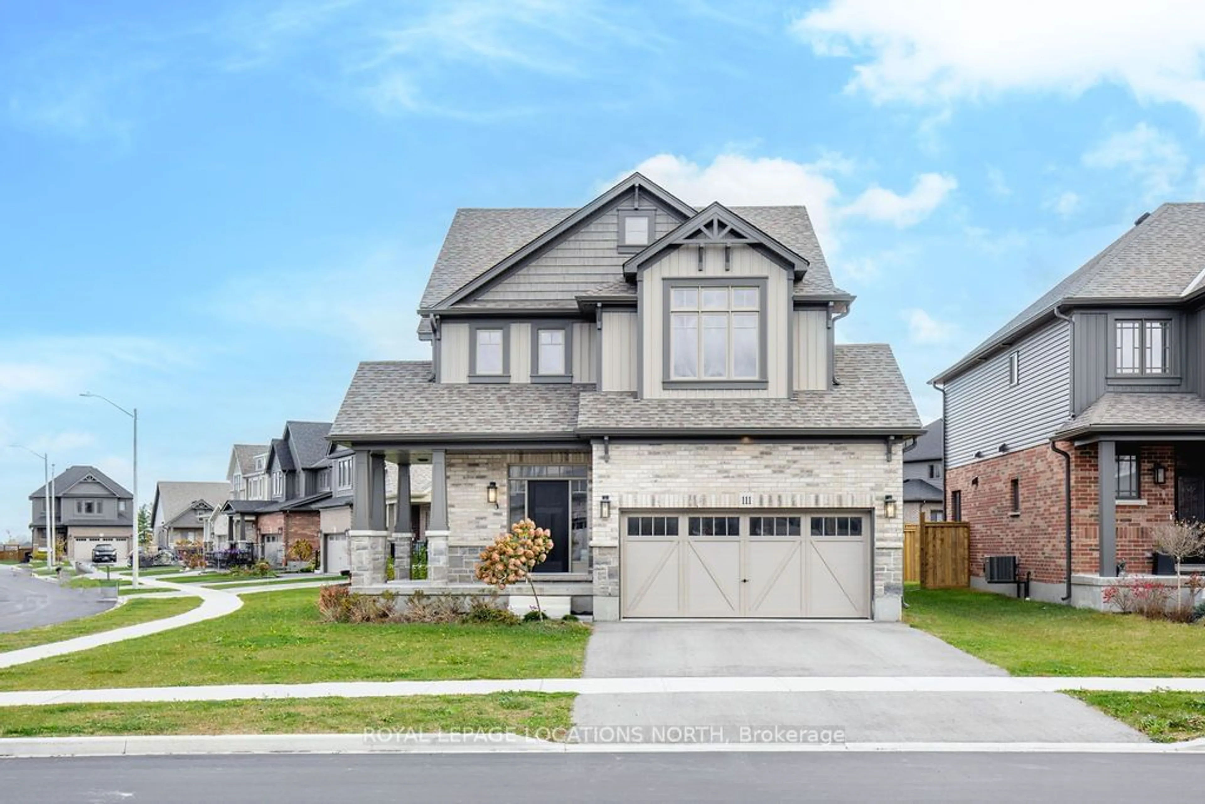 Frontside or backside of a home, the street view for 111 Plewes Dr, Collingwood Ontario L9Y 3B7